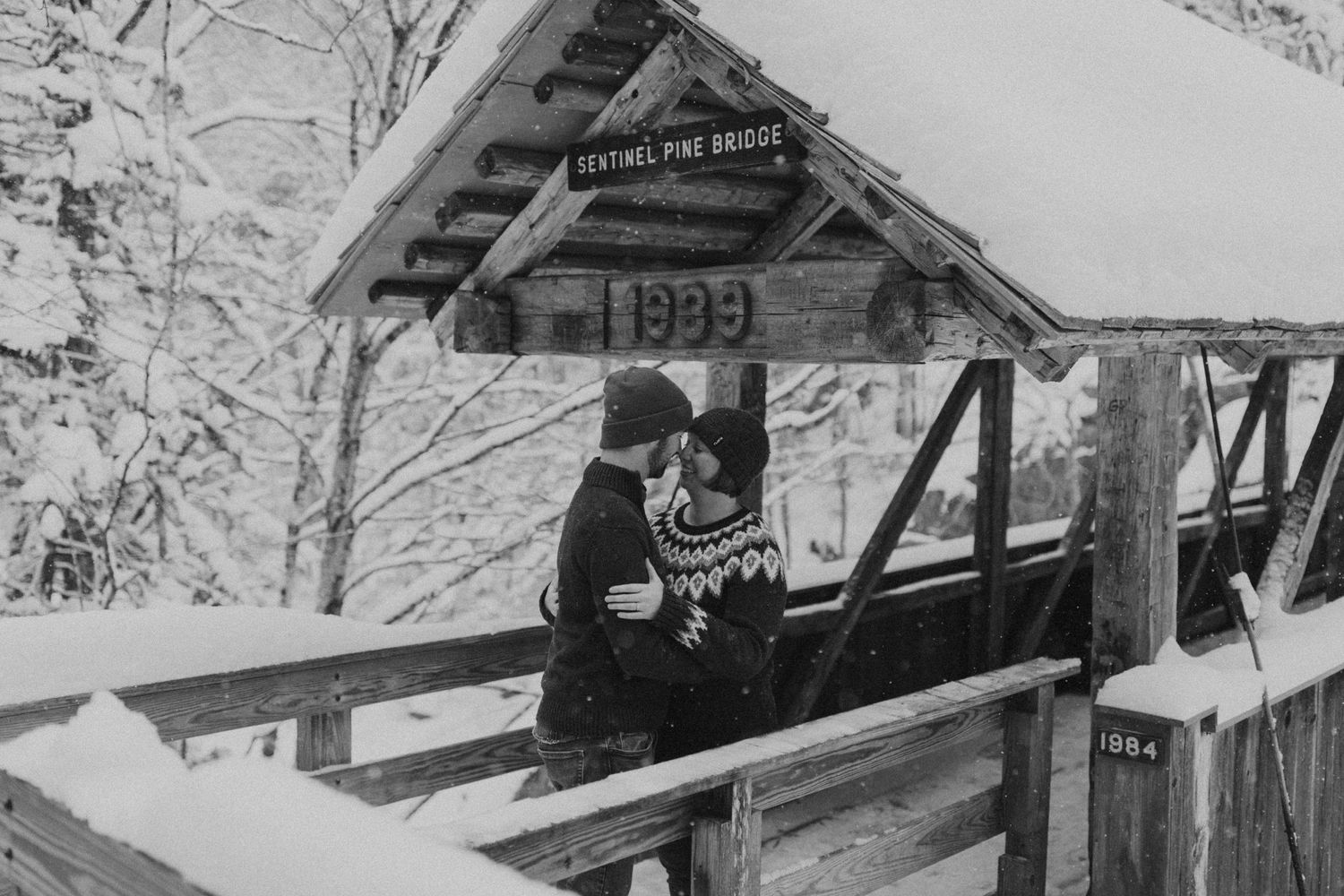 Taylor and Ken snuggling up together in a White Mountain National Forest Shelter while hiking the Flume Gorge in NH.