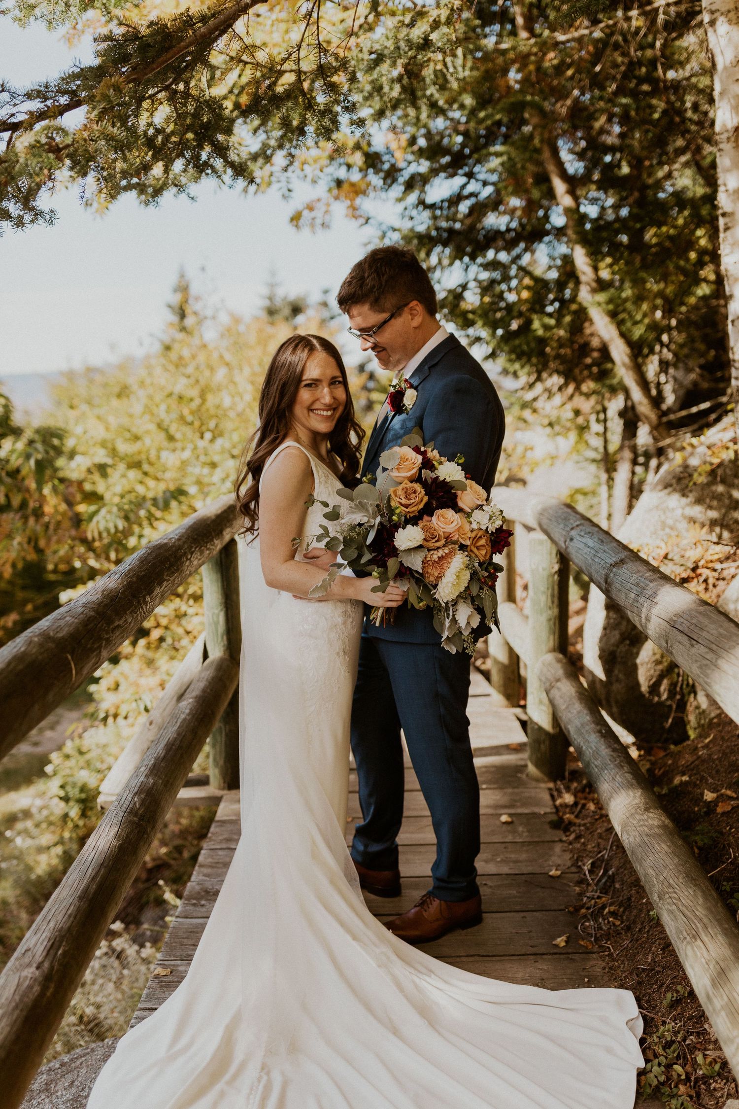 Portraits of the newlyweds on top of Loon Mountain after their fall wedding ceremony.