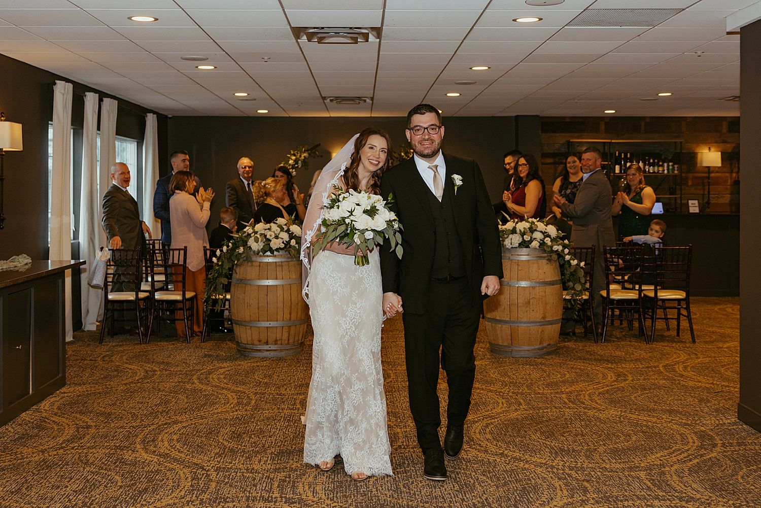 Bride and groom walking down the aisle after their NH micro wedding ceremony