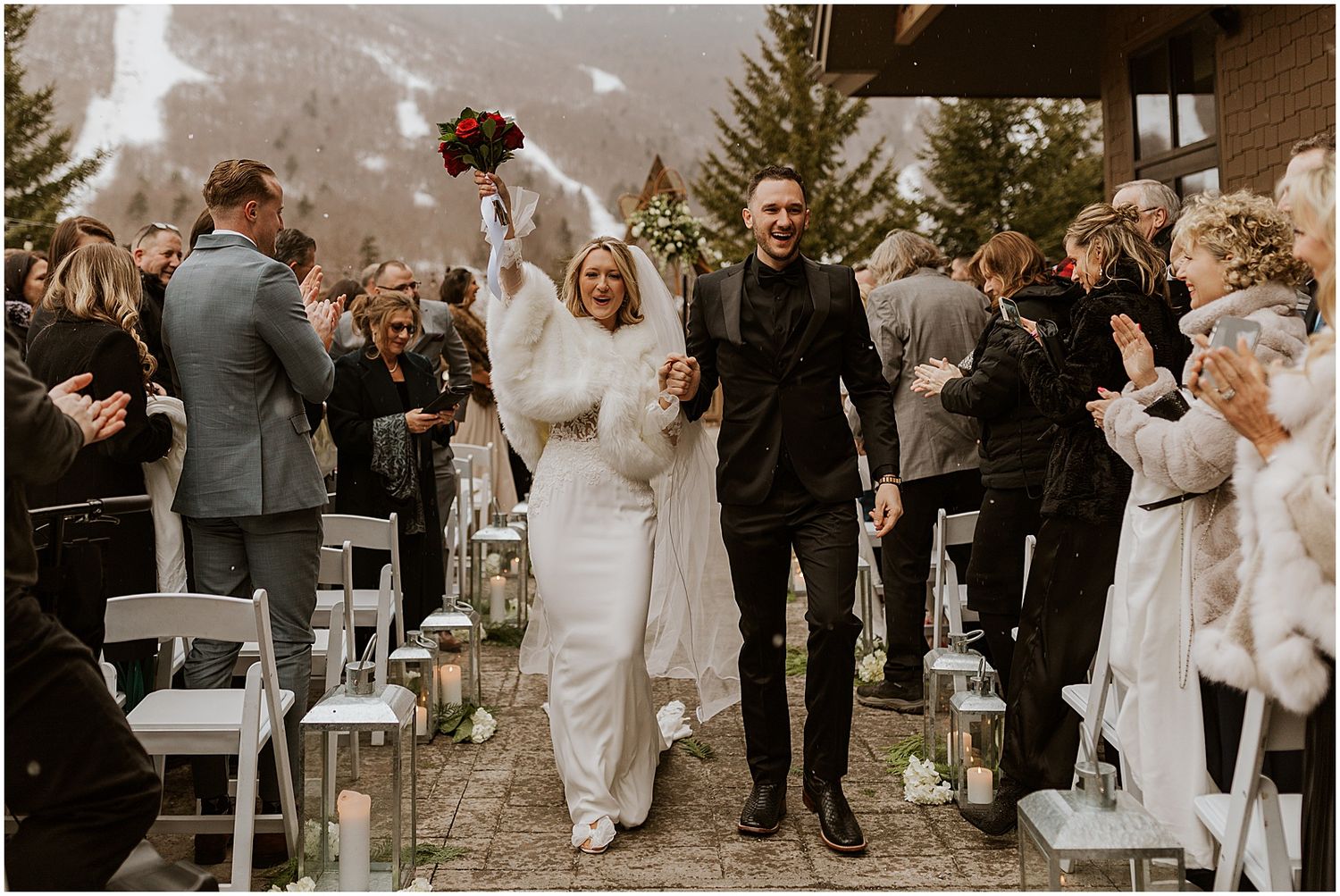 Snowy winter wedding ceremony at the Lodge at Spruce Creek