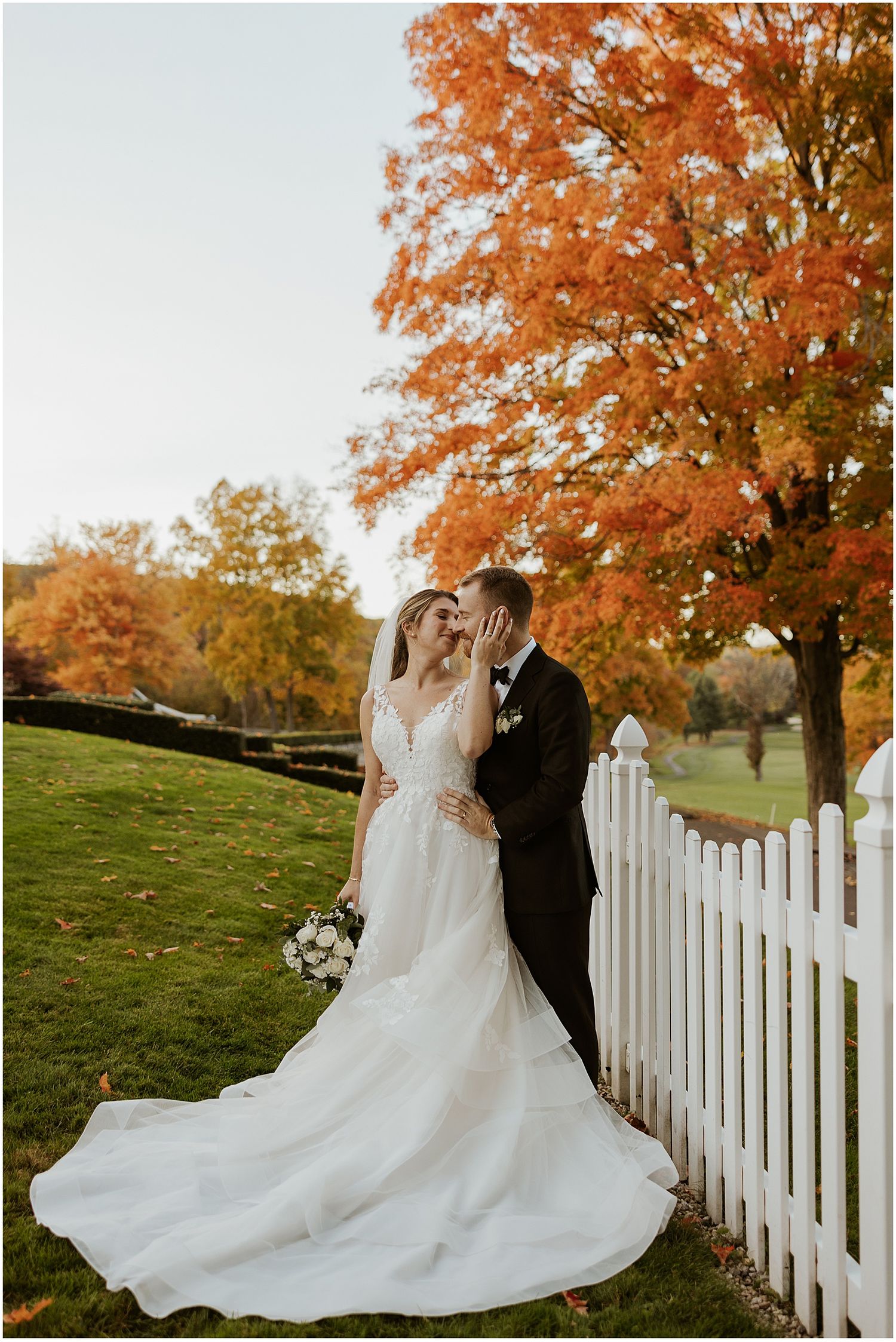Bride and groom at their Glastonbury Hills Country Club wedding in CT in the fall