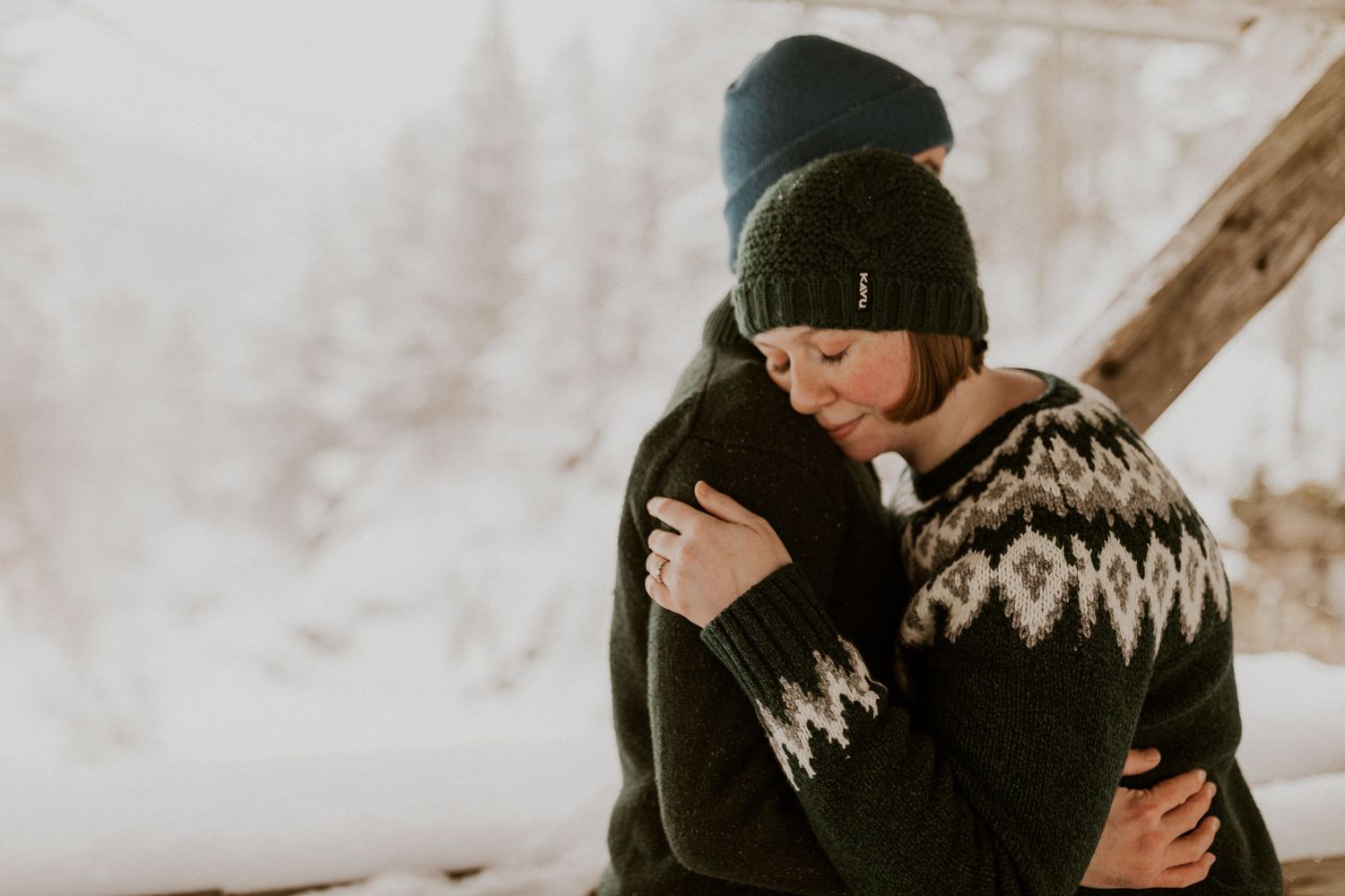 Taylor and Ken snuggling up together in a White Mountain National Forest Shelter while hiking the Flume Gorge in NH.