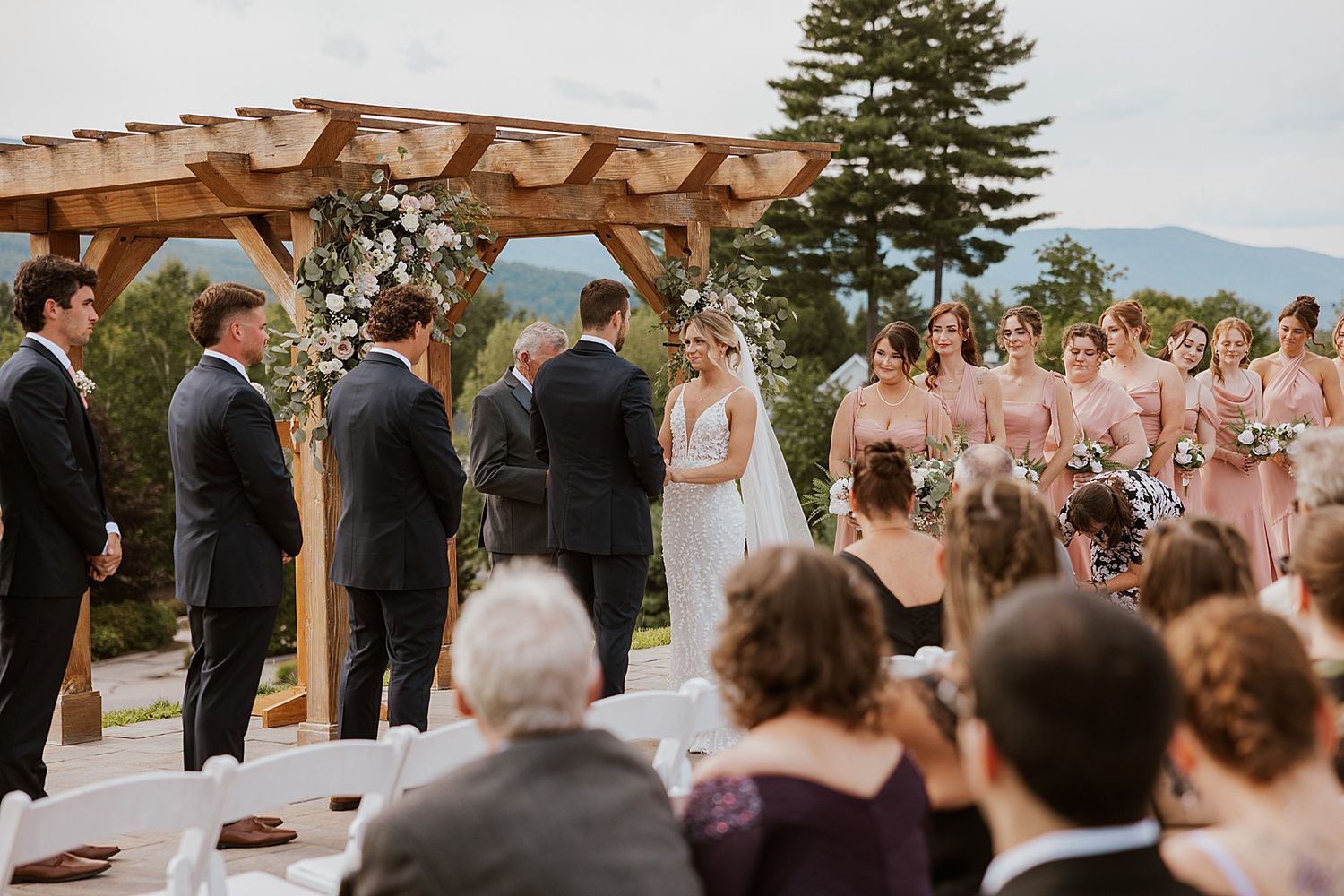 Wedding ceremony outside the Sunset Pavilion at the Owl's Nest Resort in New Hampshire