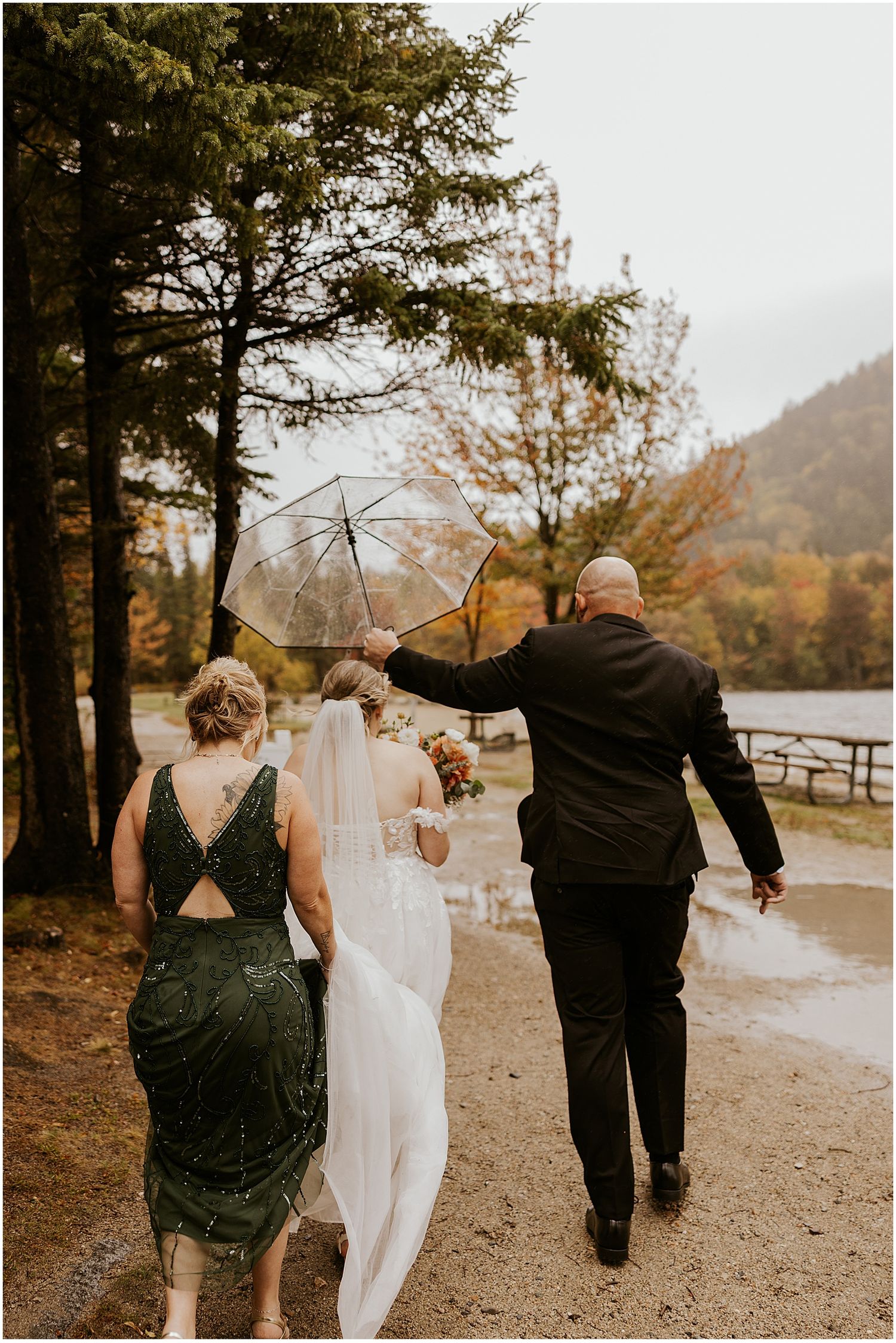 Bride and groom walking to their NH elopement site at Echo Lake