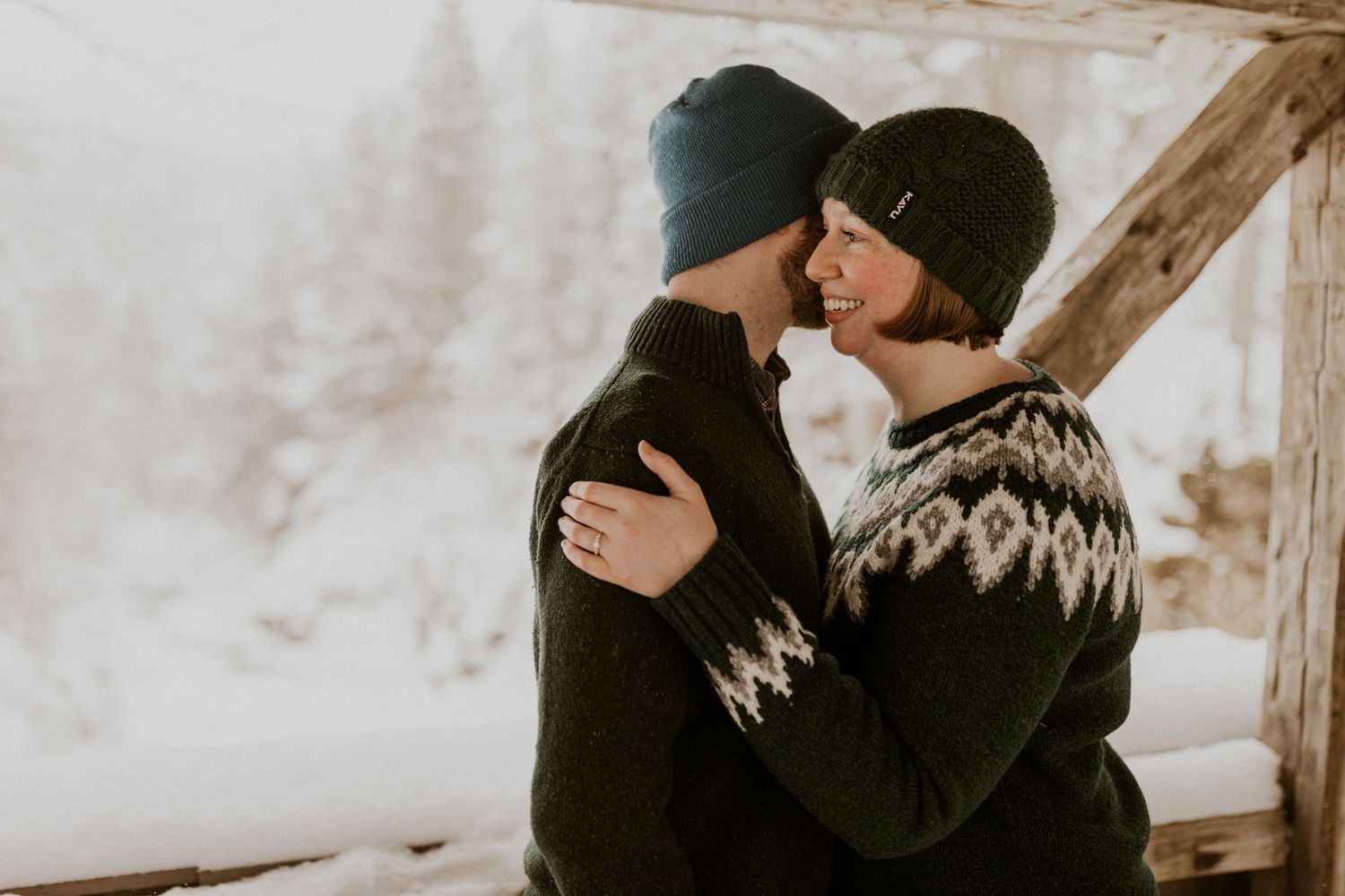 Taylor and Ken snuggling up together in a White Mountain National Forest Shelter while hiking the Flume Gorge in NH.