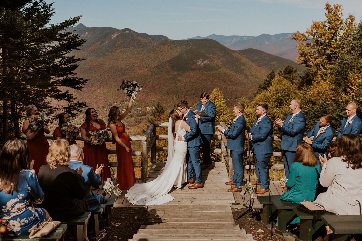 Mountaintop wedding ceremony during peak foliage in Lincoln New Hampshire.