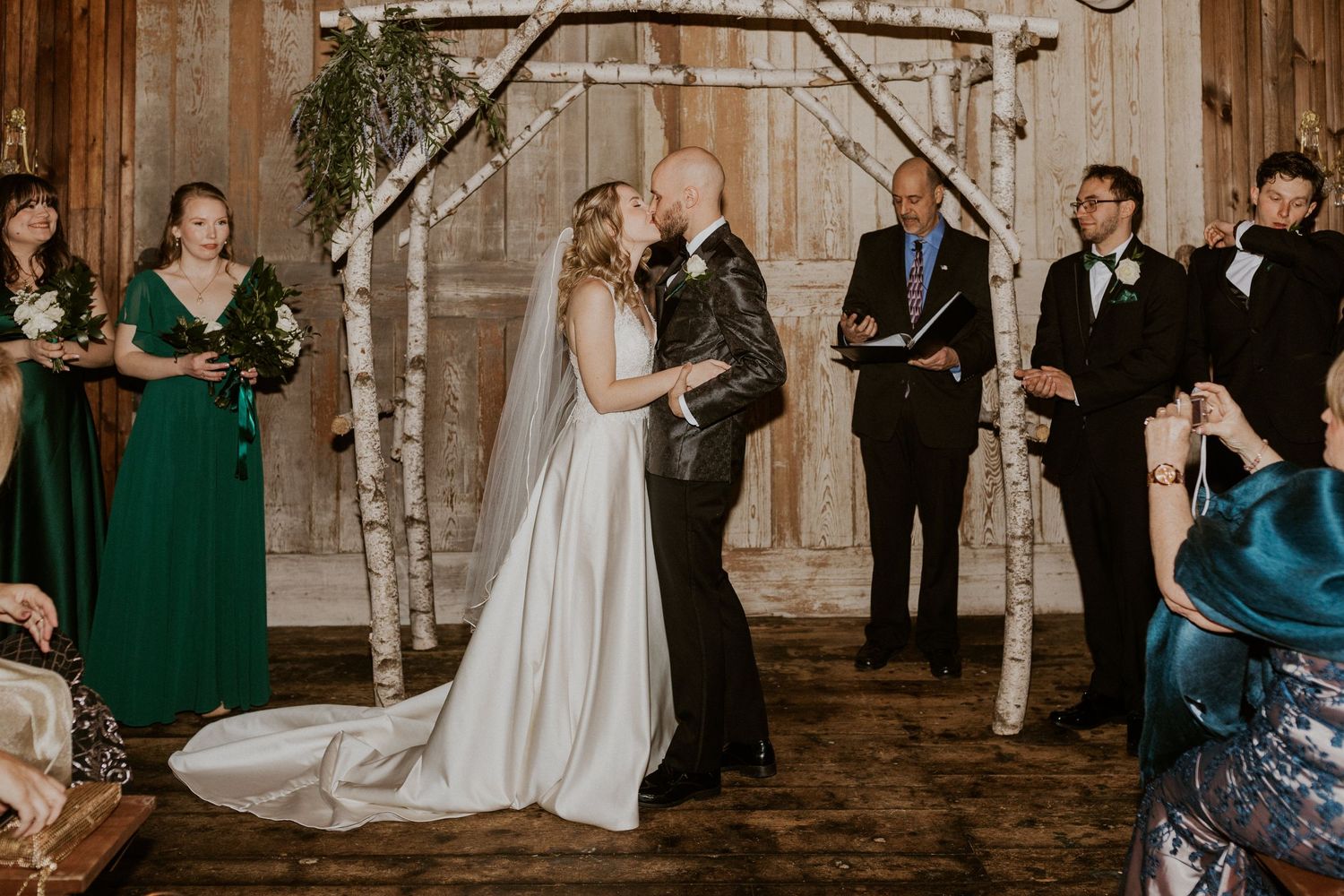 Deirdre and Brodie sealing their marriage with a kiss at their wedding at The Preserve in Tamworth New Hampshire.