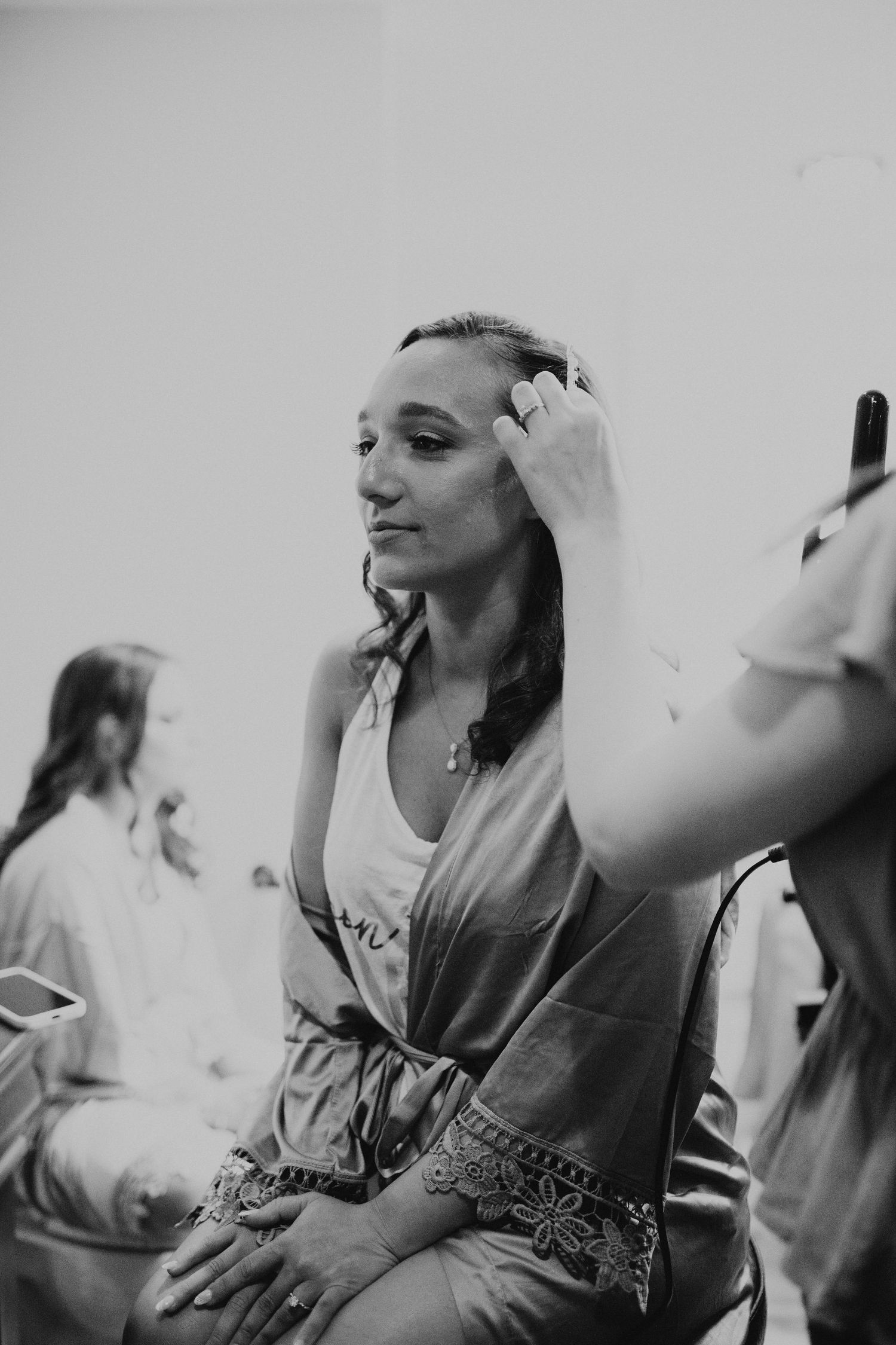 Chrissy, the bride to be, having her hair and makeup done