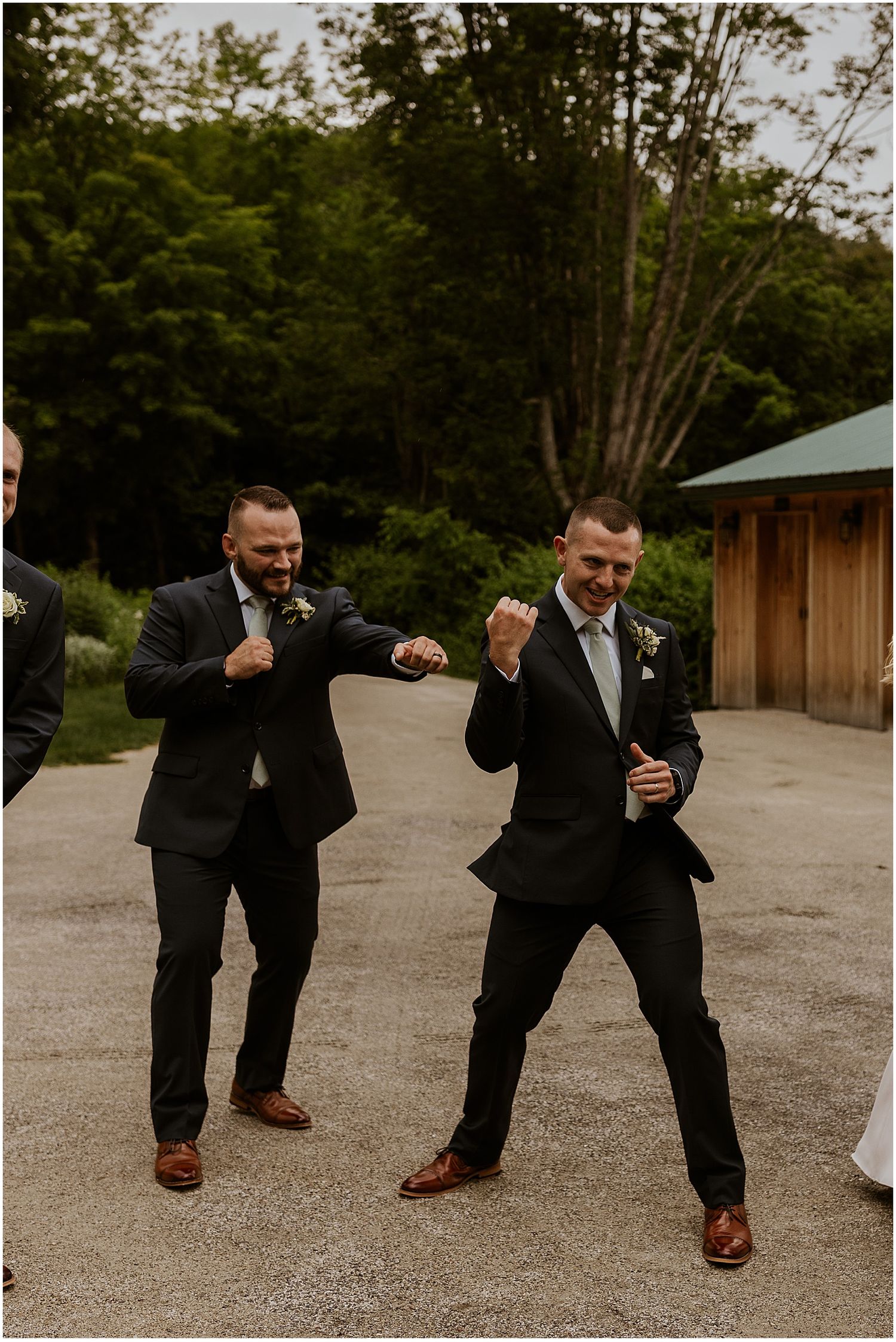 Groomsmen in black suits playfully posing and dancing in a sequence of candid wedding photos.