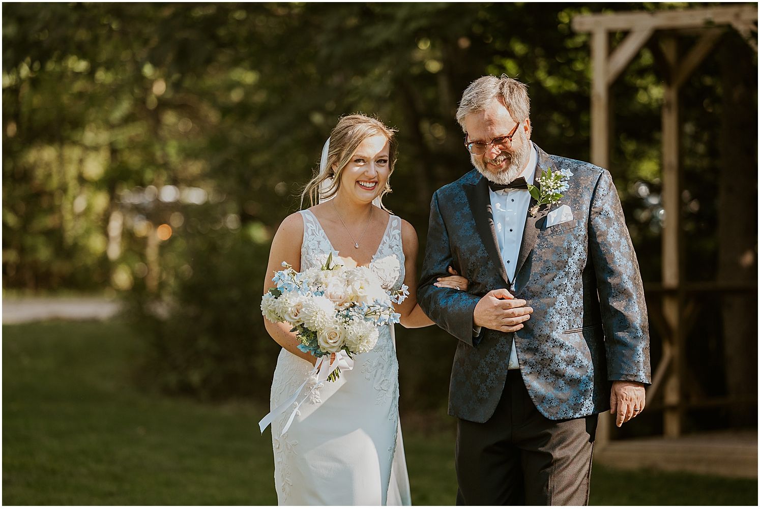 Outdoor wedding ceremony moments captured in a garden setting with natural sunlight.