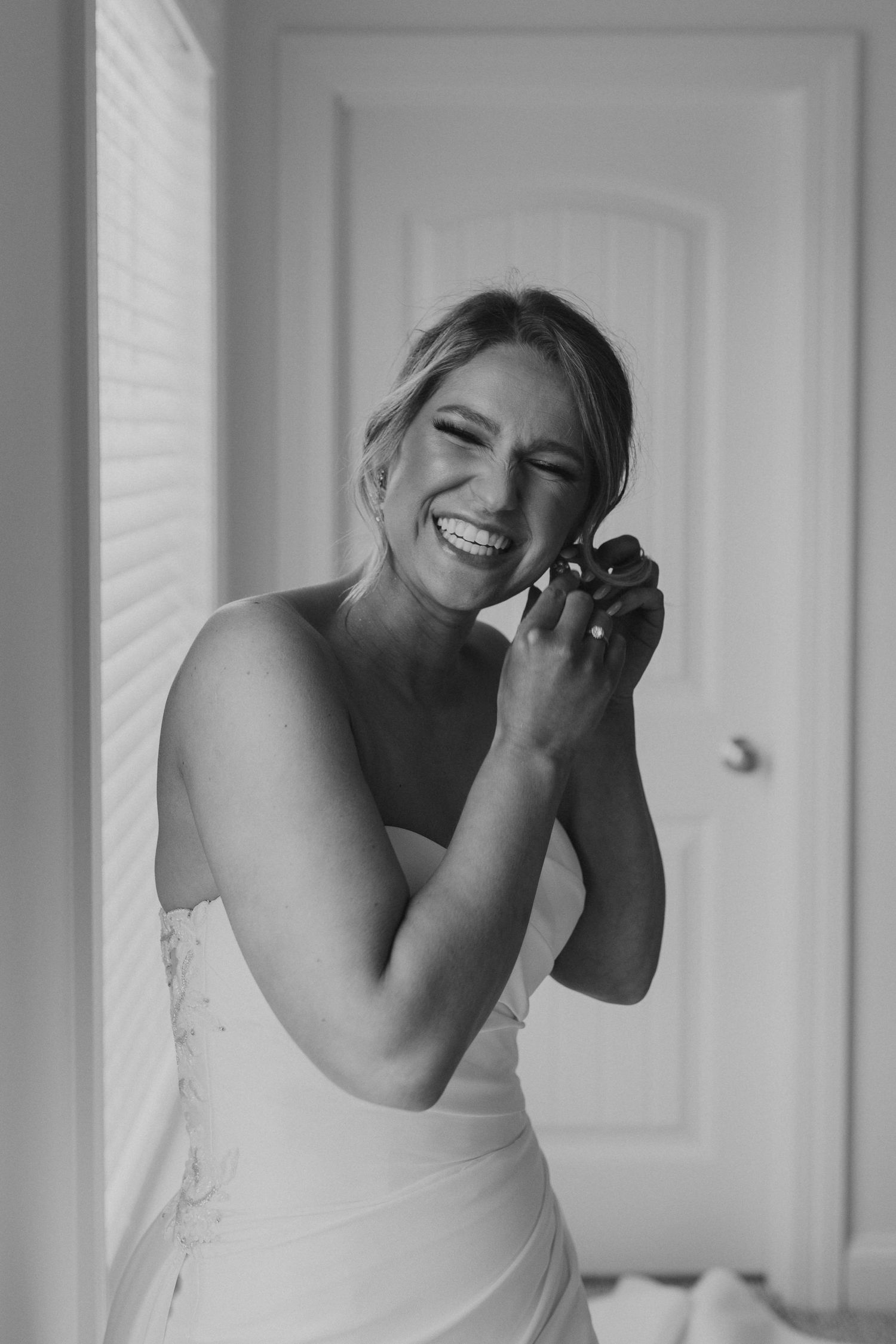 Kendra getting ready for the wedding ceremony at Owl's Nest Resort Lake House.