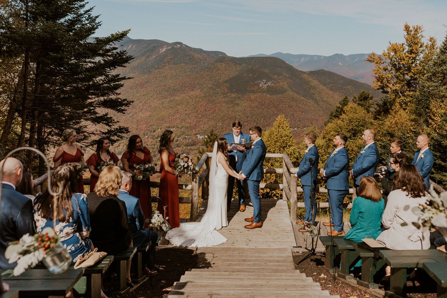 Mountaintop wedding ceremony during peak foliage in Lincoln New Hampshire.