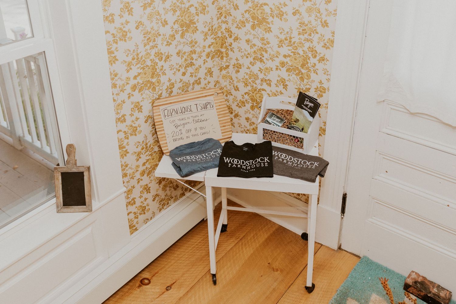 The Woodstock Farmhouse table with marketing material.