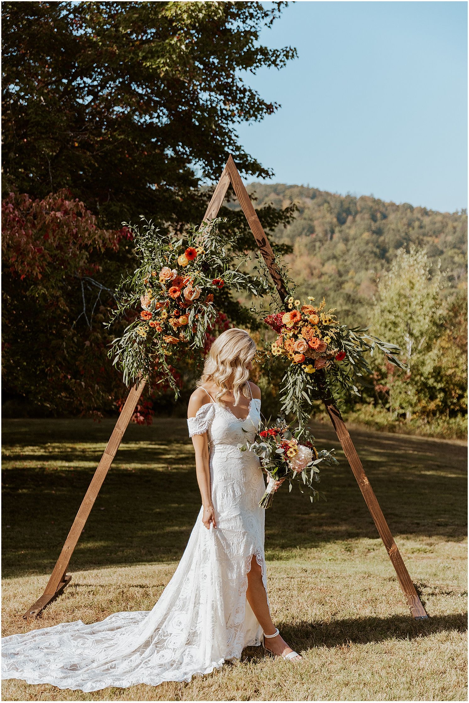 Bride under triangle ceremony arch NH