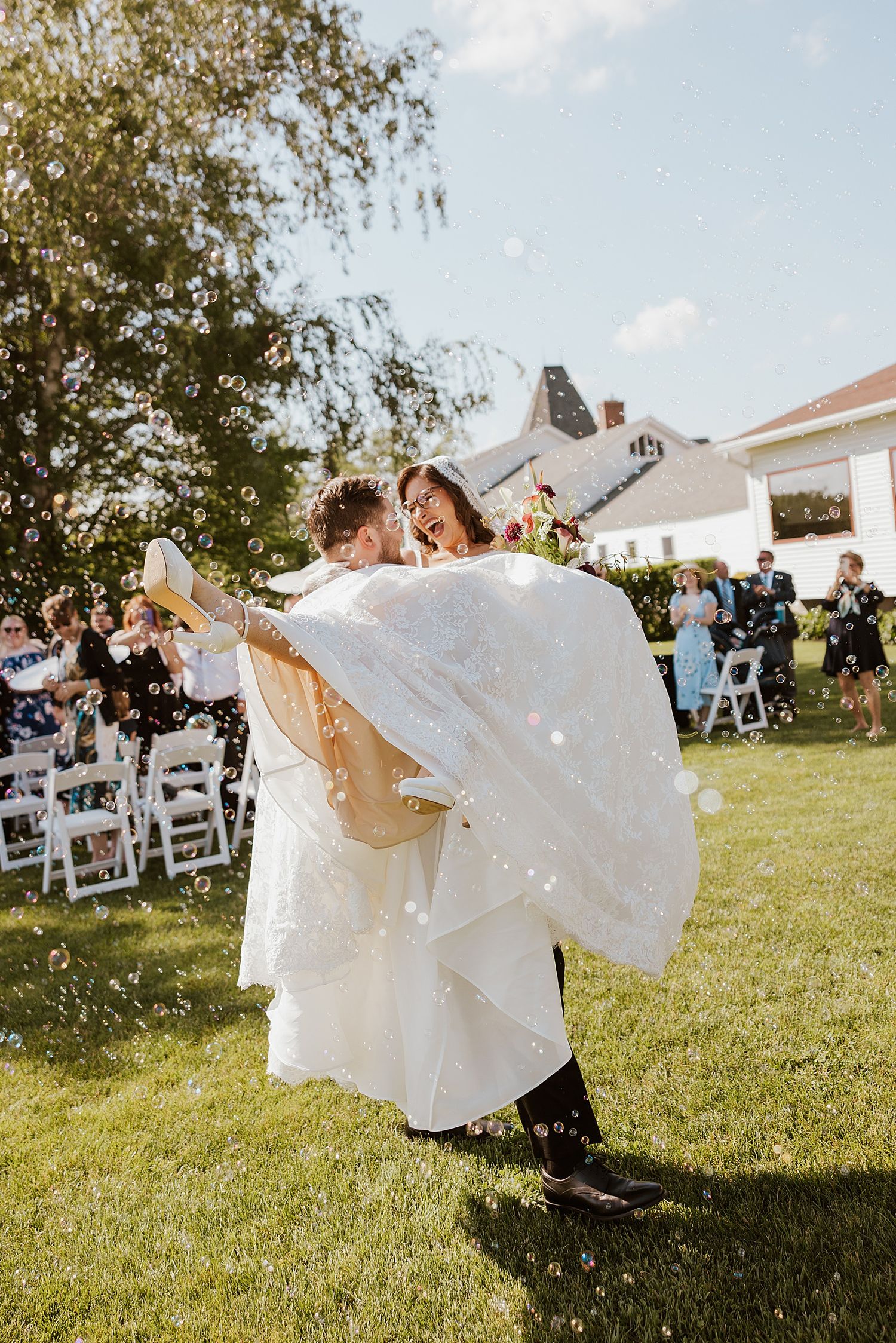 Bride and groom after their wedding ceremony at Dell-Lea Weddings and Events in NH