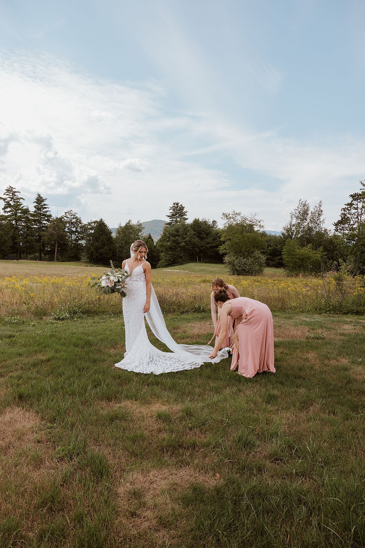 Bride posing for portrait photos at her New Hampshire wedding