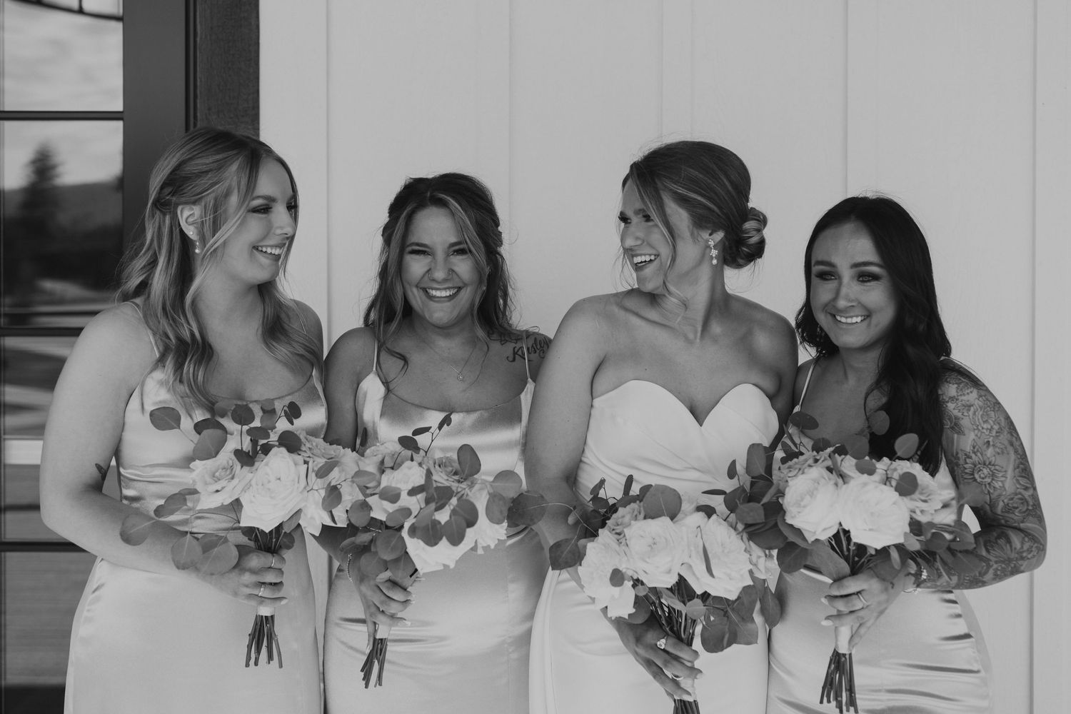 Bridesmaid photos of Kendra and her girls on the Lake House balcony at Owl's Nest Resort in Thornton New Hampshire