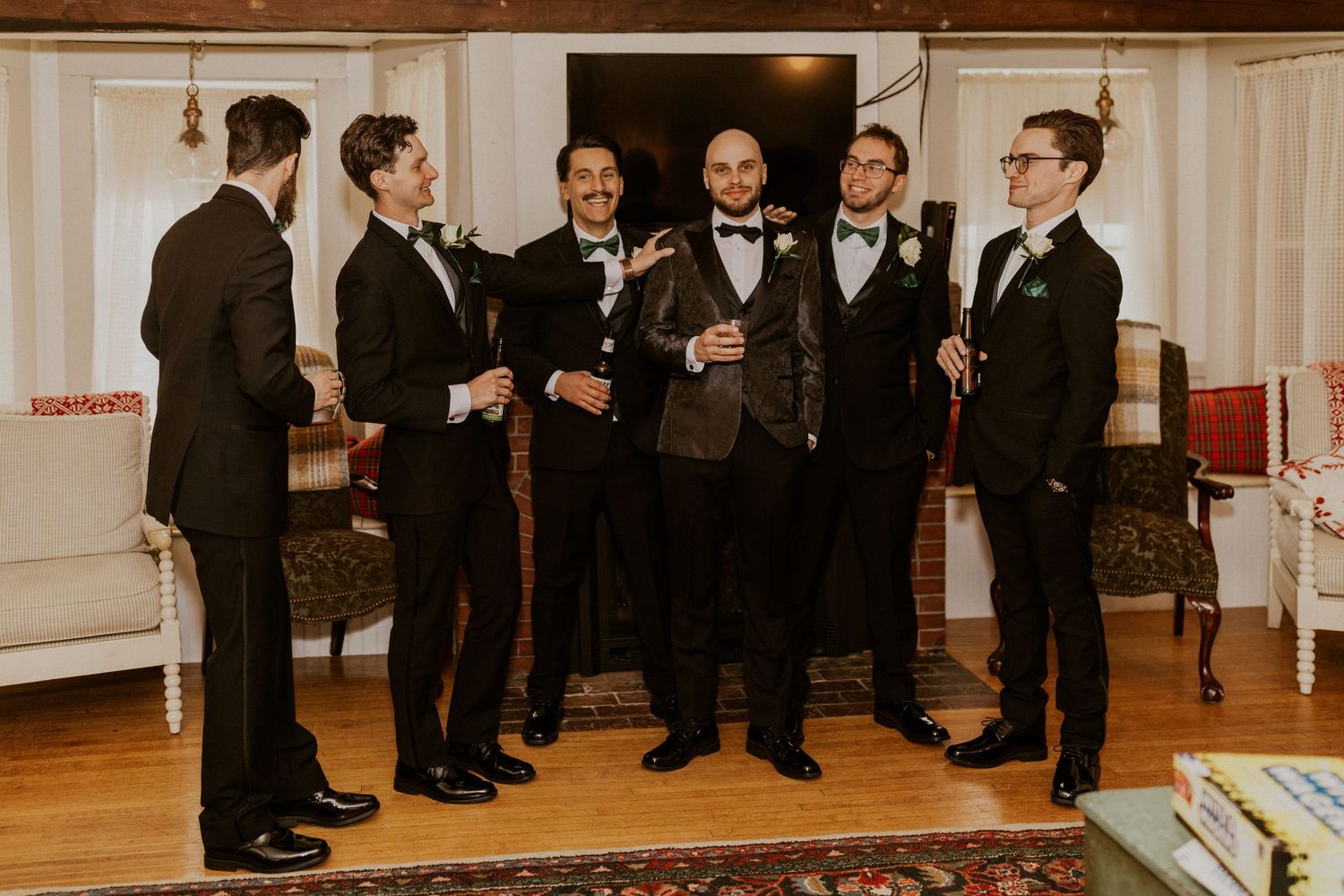 Groom and his groomsmen enjoying themselves before the wedding ceremony begins.