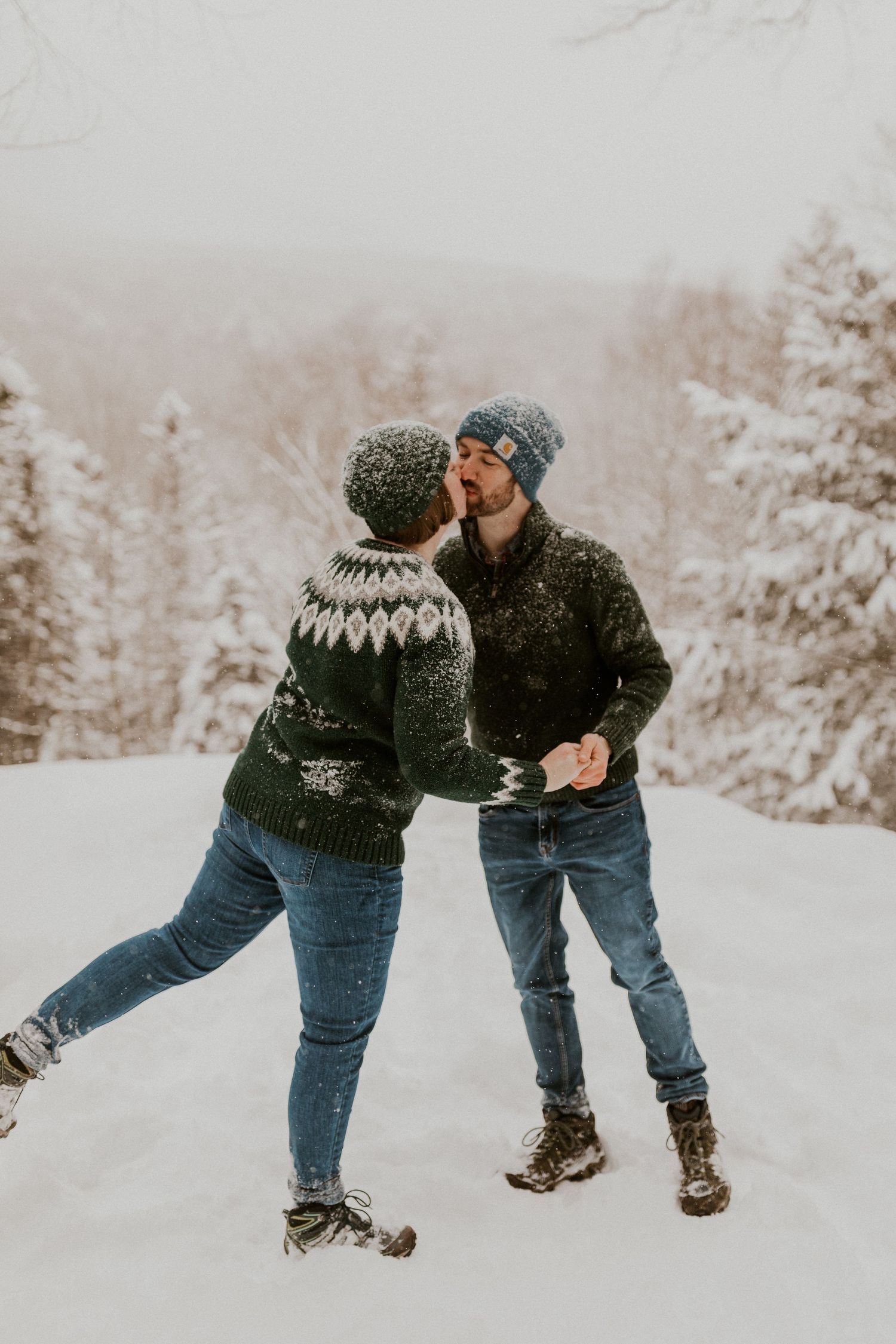 Taylor and Ken snuggling up together in a White Mountain National Forest Shelter while hiking the Flume Gorge in NH.