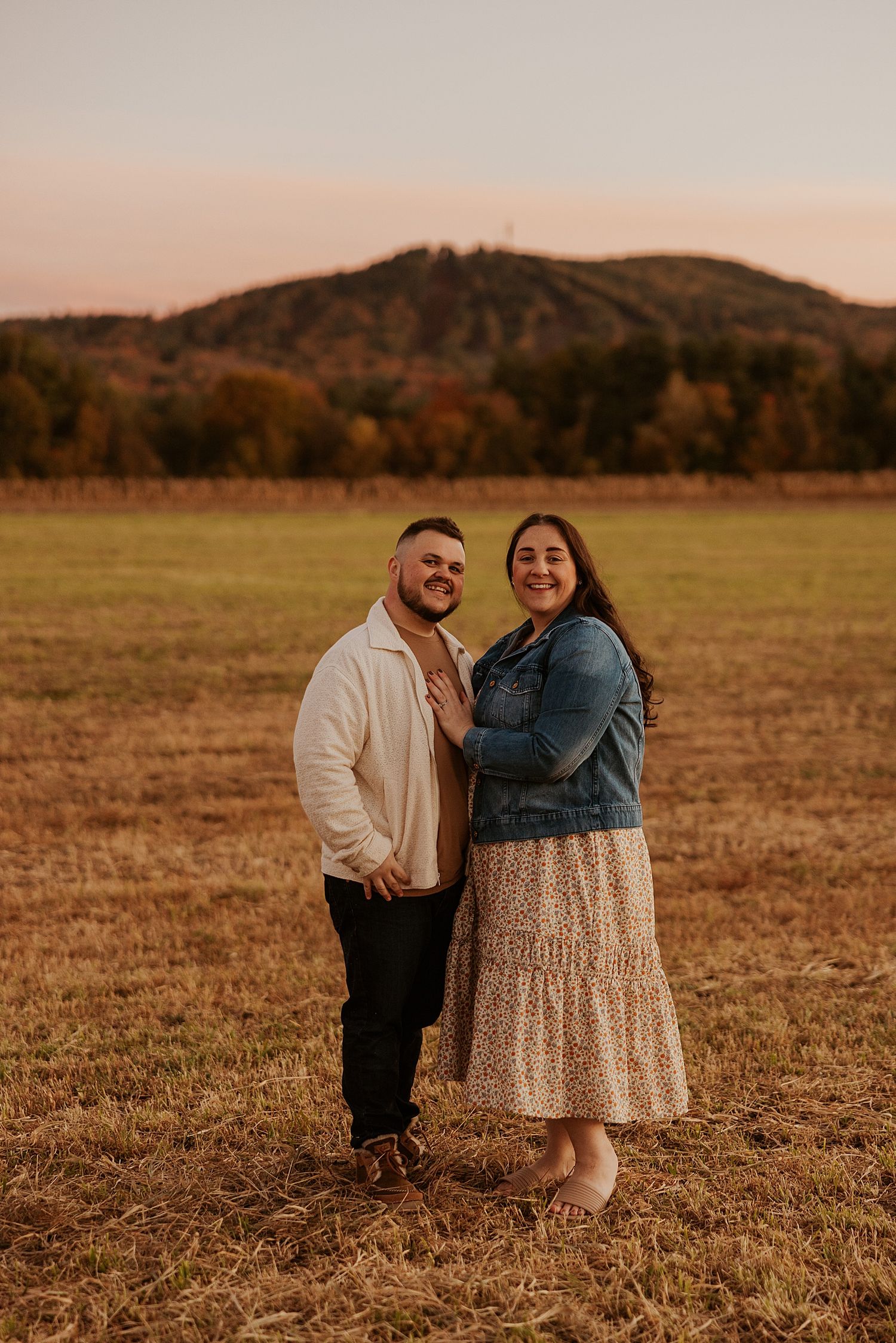 Couple taking fall family photos in New Hampshire