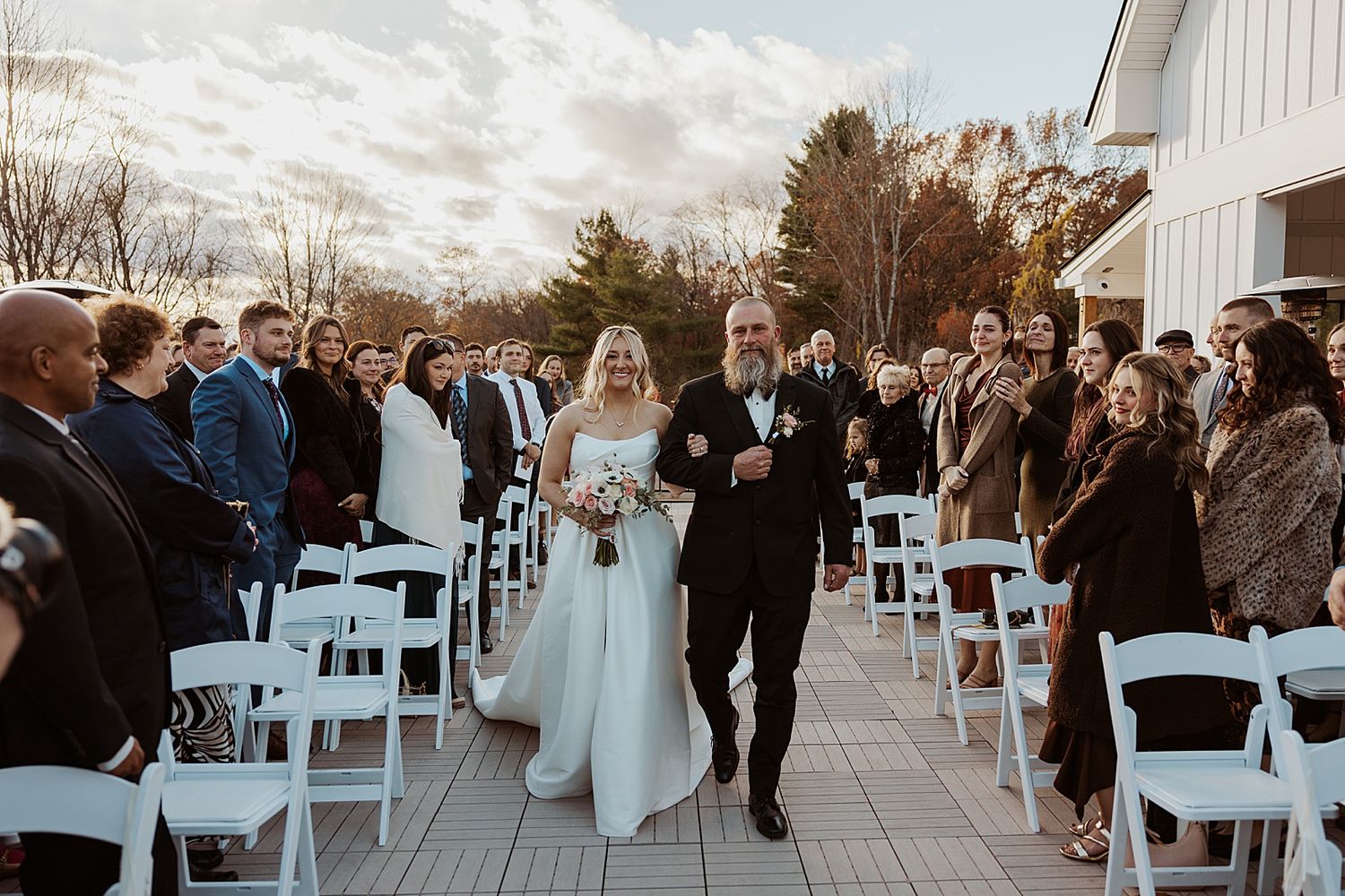 Bride walking down the aisle at Hyla Brook Estate in NH