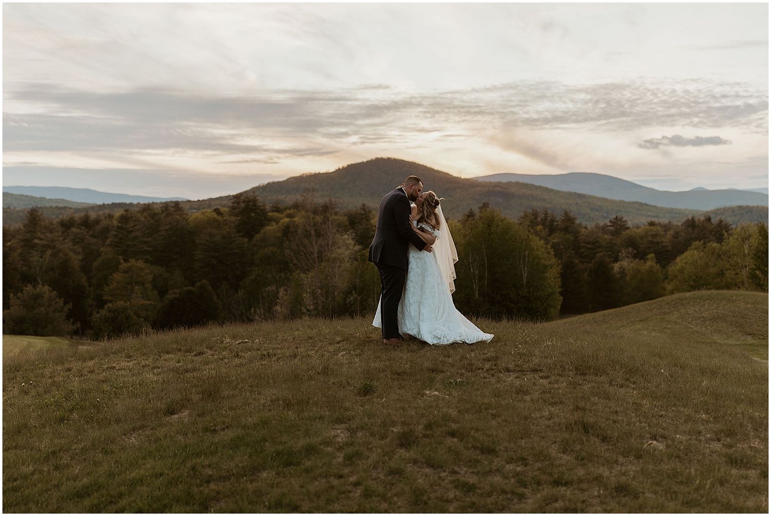NH couple taking sunset portraits at their Owls Nest wedding