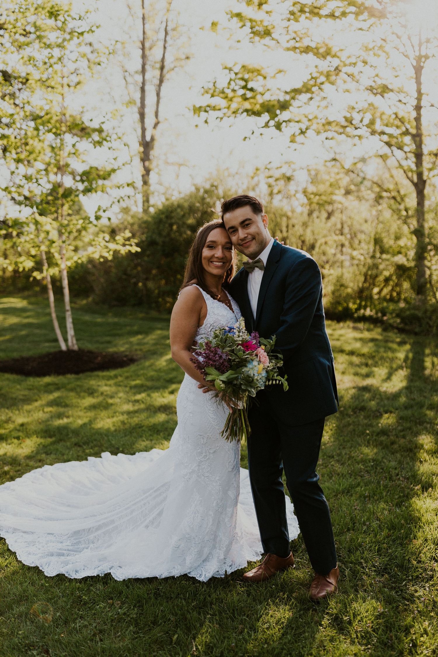 Chrissy and Mike posing for a happy portrait together.