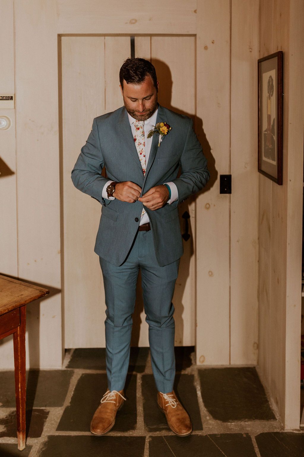 Groom getting ready light blue suit.jpg