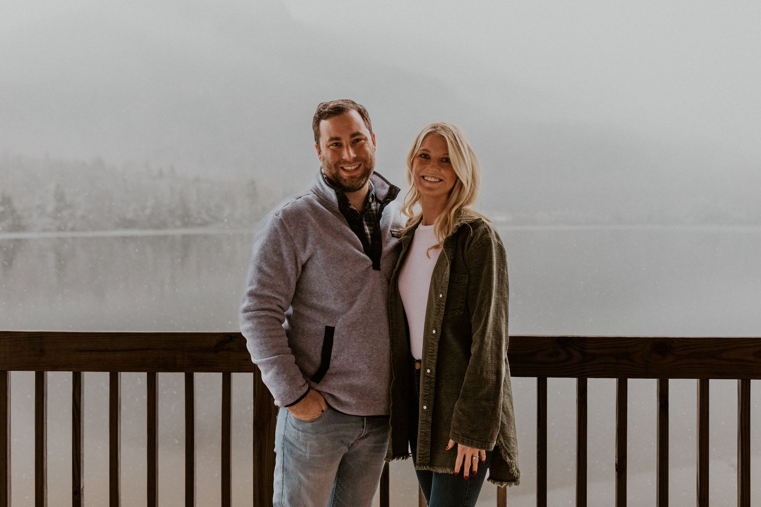Newly engaged couple playfully posing for photos during their engagement session in Franconia New Hampshire.
