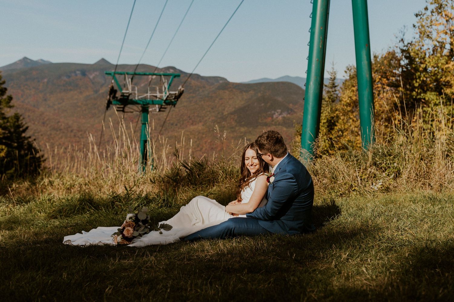 Portraits of the newlyweds on top of Loon Mountain after their fall wedding ceremony.