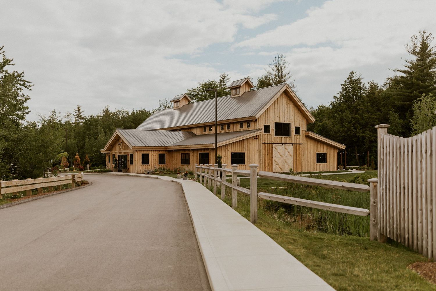 Early summer wedding at the Barn at Bull Meadow in Concord New Hampshire
