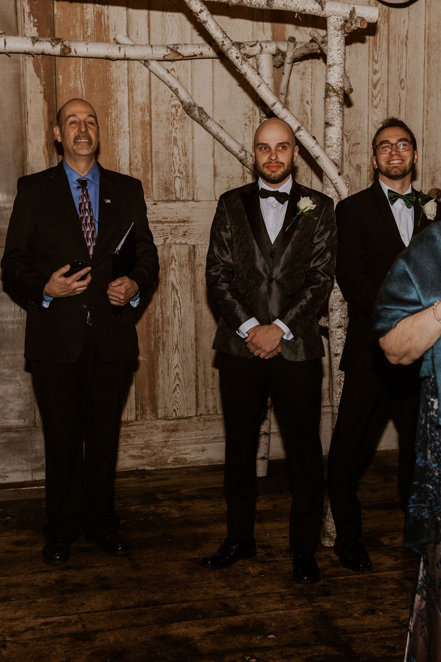 Brodie waiting for his bride to walk down the aisle during their wedding ceremony in Tamworth New Hampshire.