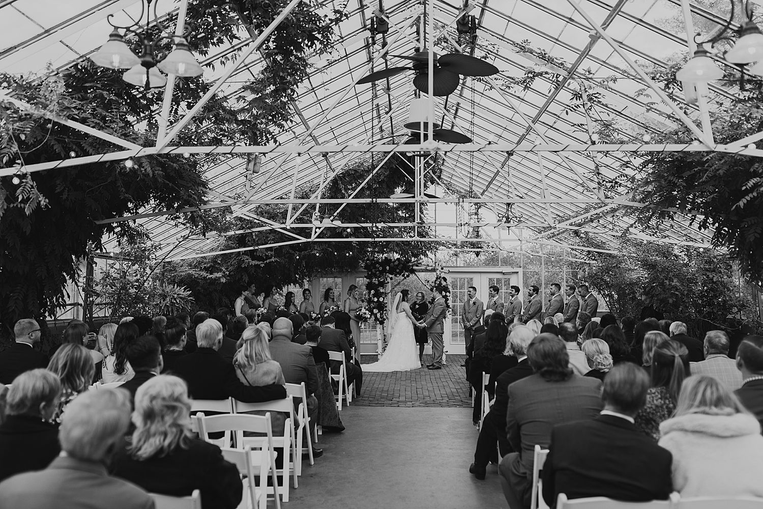 Wedding ceremony in the greenhouse at the Barn on the Pemi in New Hampshire