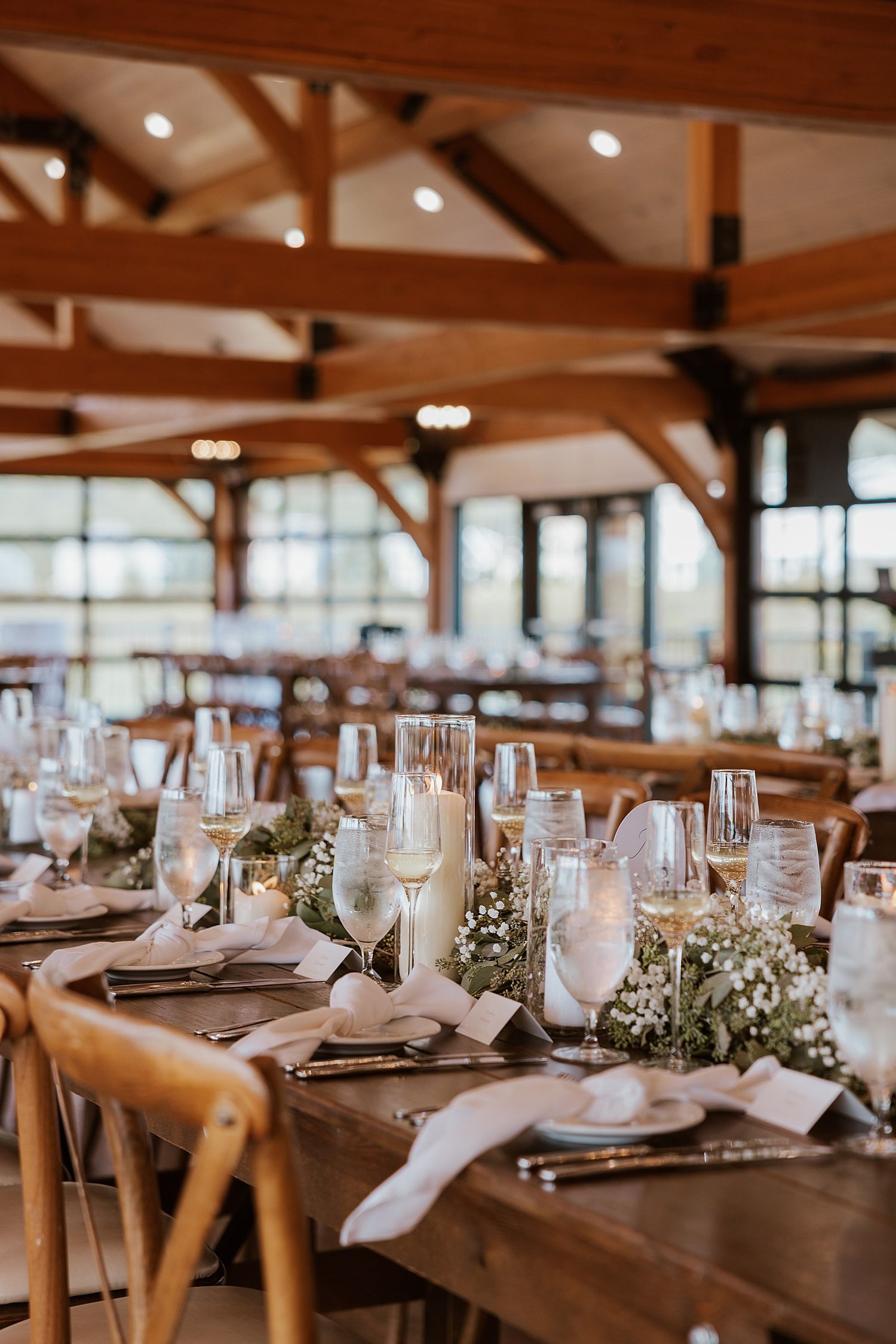 Wedding reception table decor at the Sunset Pavilion at the Owl's Nest Resort