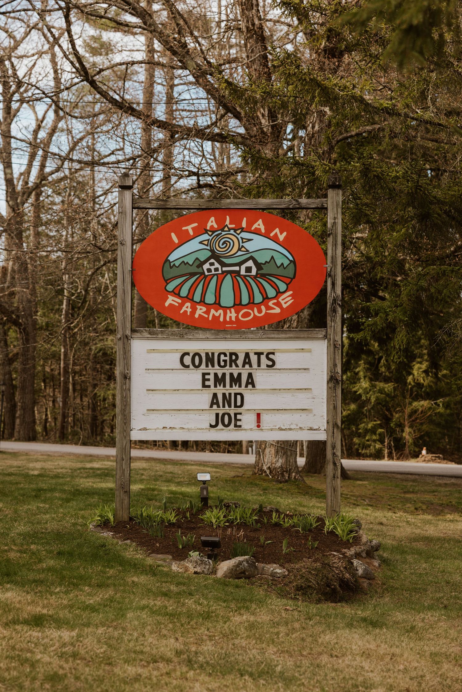 Italian Farmhouse venue sign congratulating Emma and Joe on their wedding day.