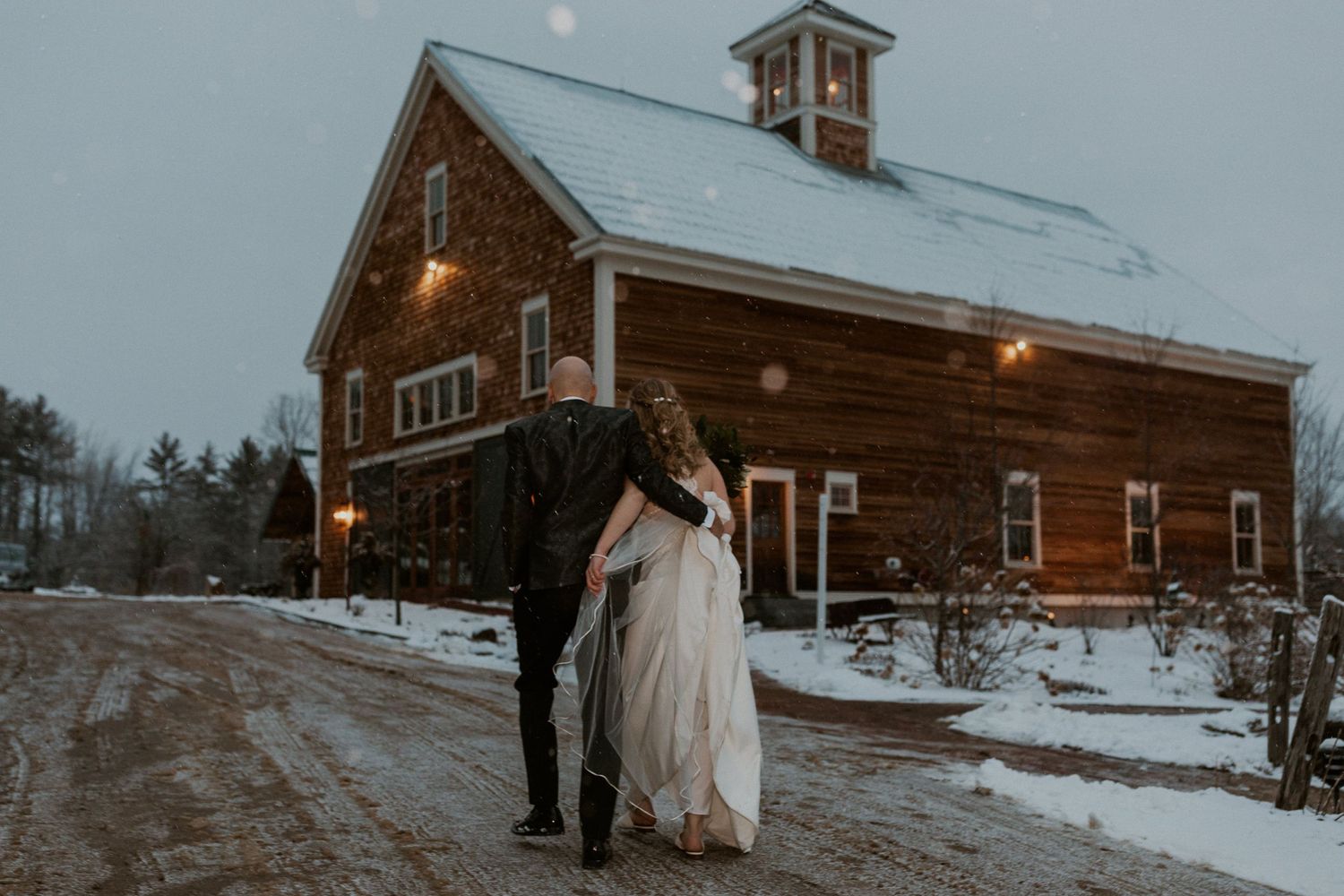 Deirdre and Brodie heading into their wedding reception at The Preserve in Tamworth New Hampshire.