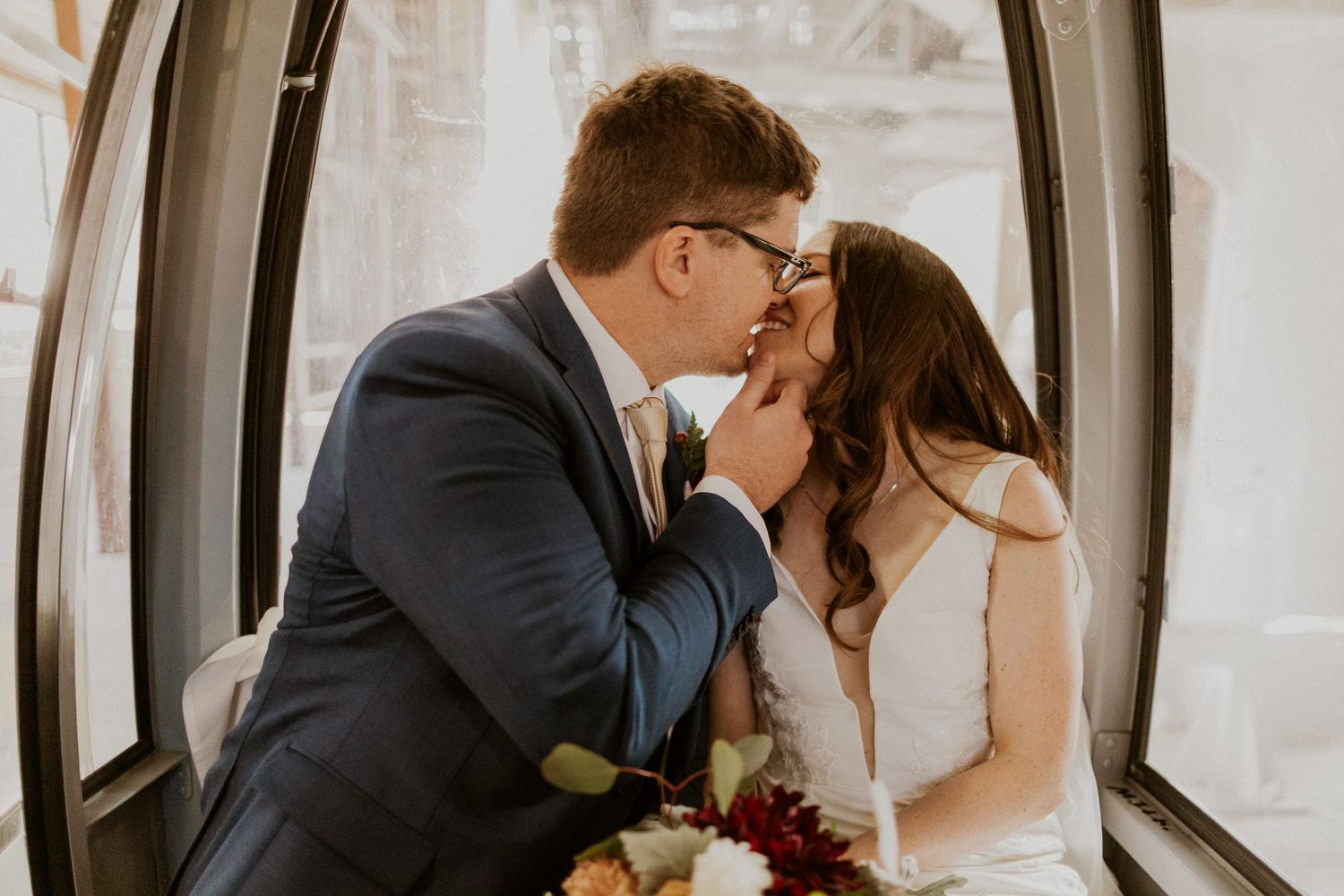 Portraits of the newlyweds on top of Loon Mountain after their fall wedding ceremony.