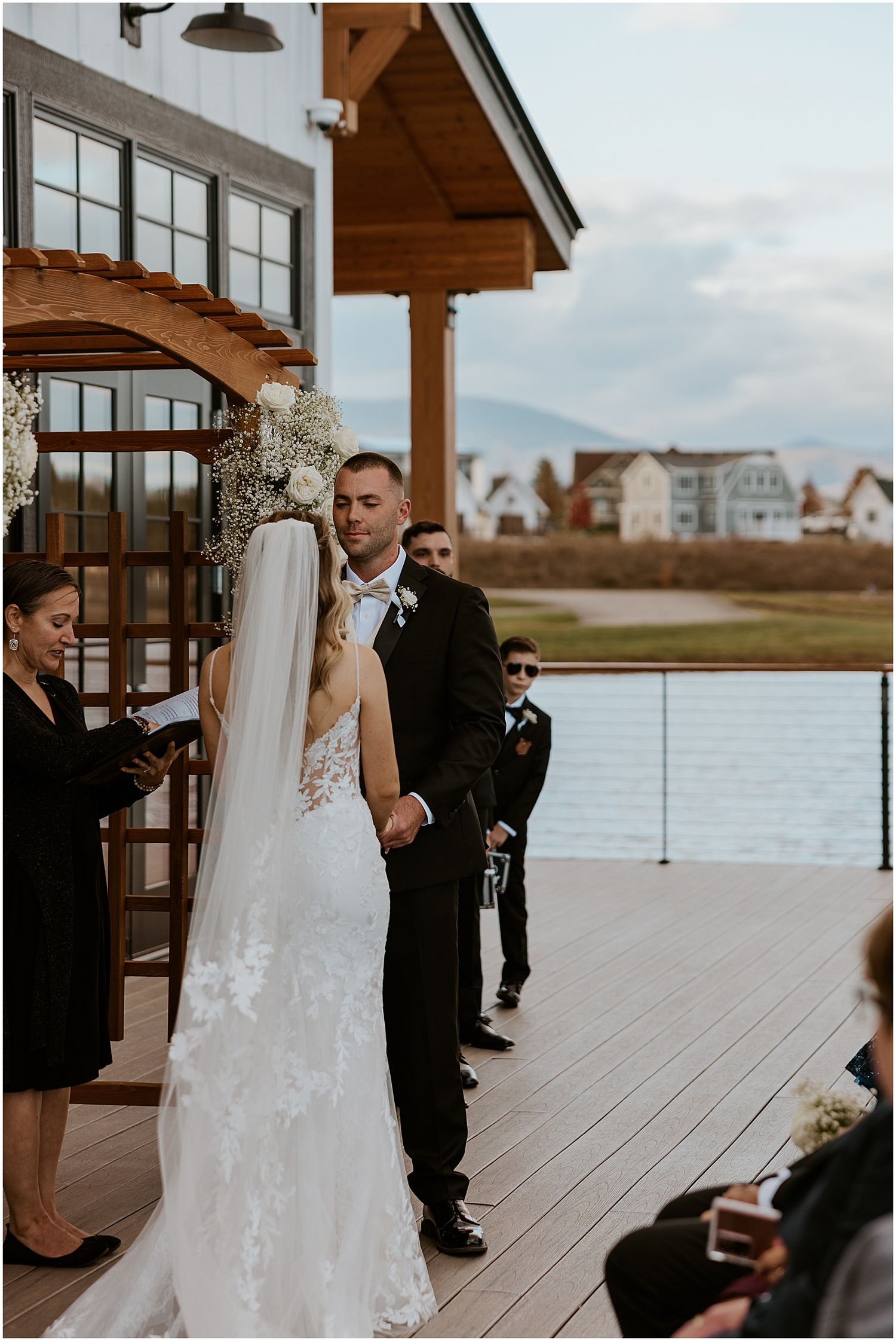 Couple at their wedding ceremony at the Owls Nest Resort, one of the best outdoor wedding venues in NH