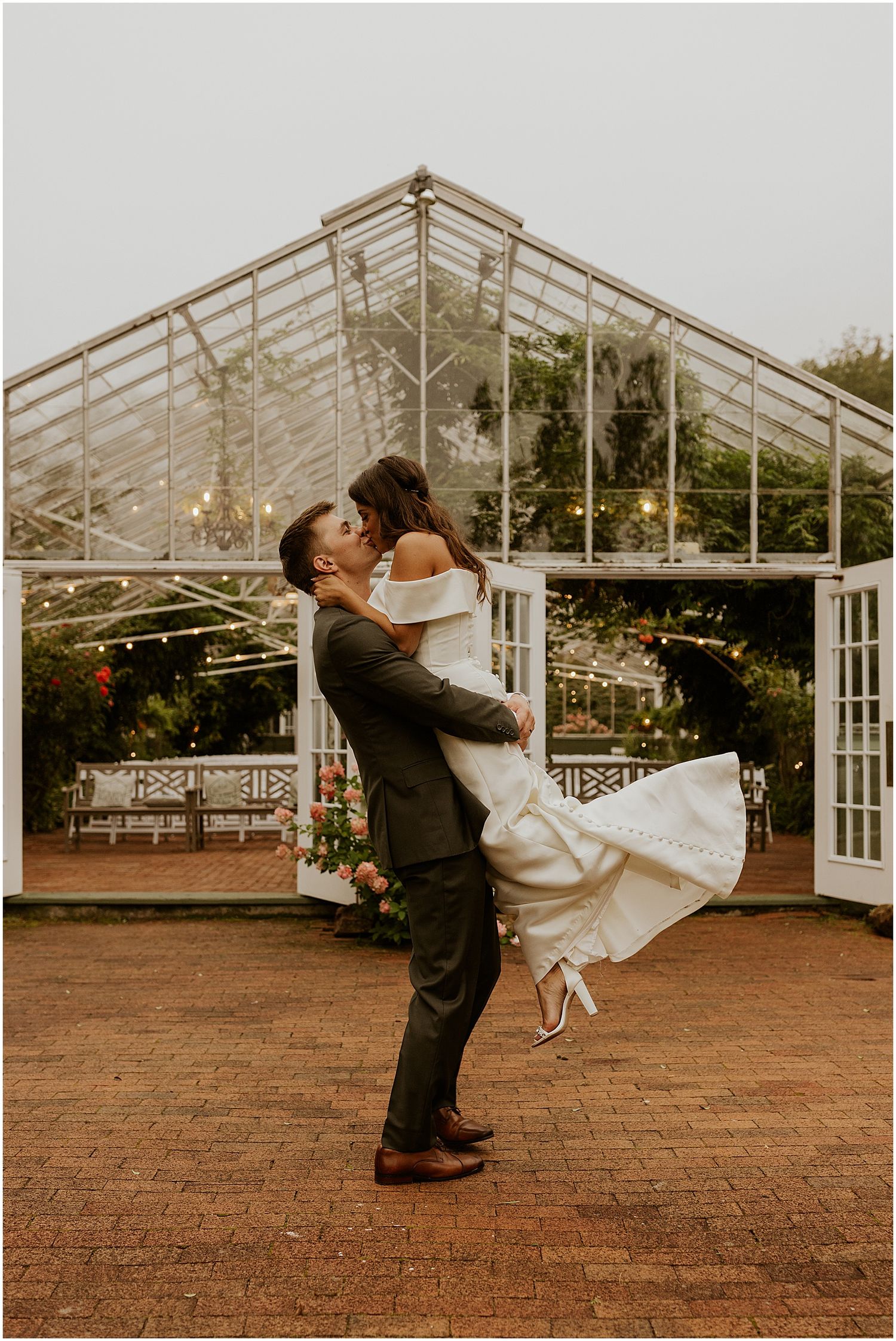 Bride and groom at the Barn on the Pemi greenhouse