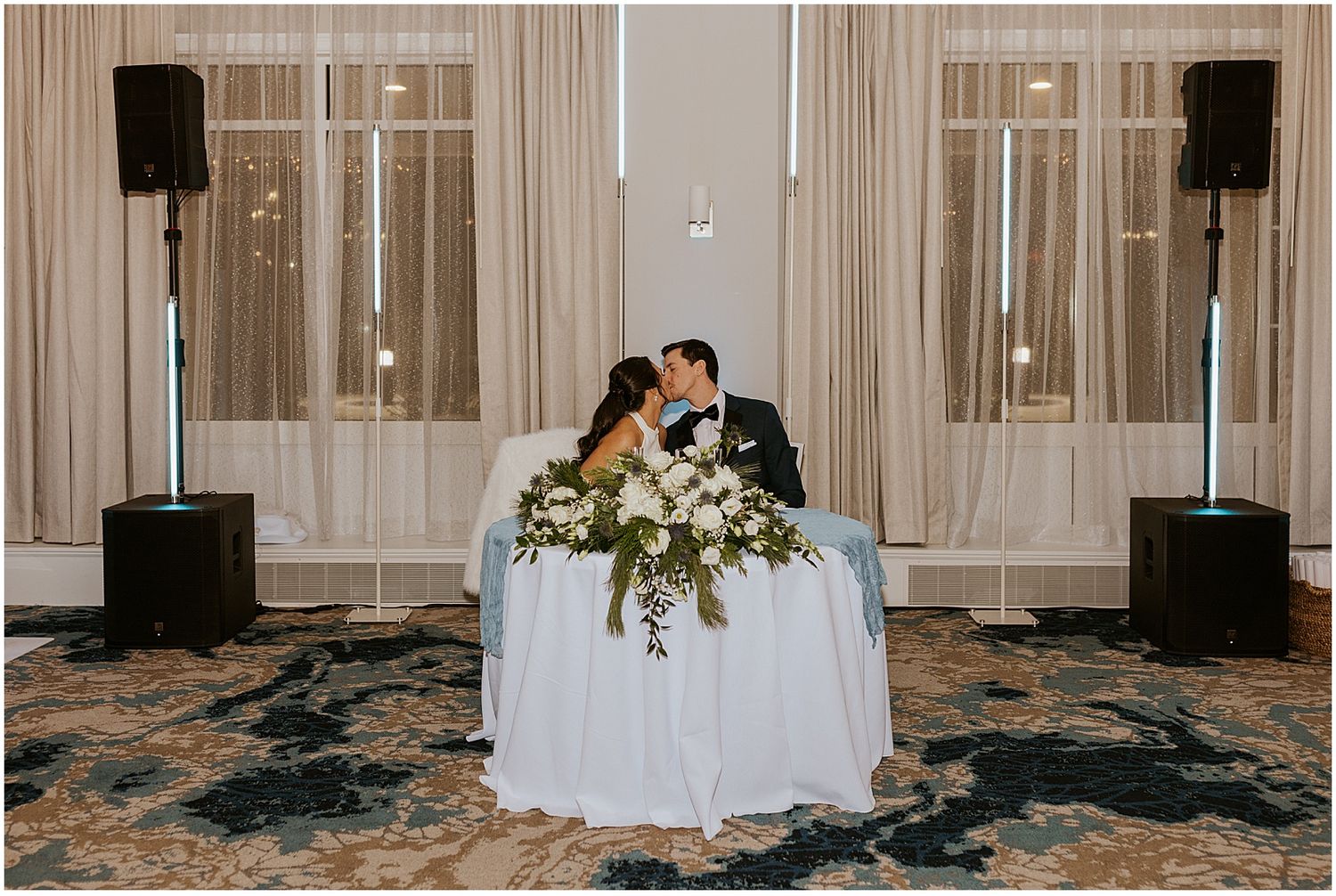 Bride and groom at their River Walk Resort wedding reception at Loon Mountain