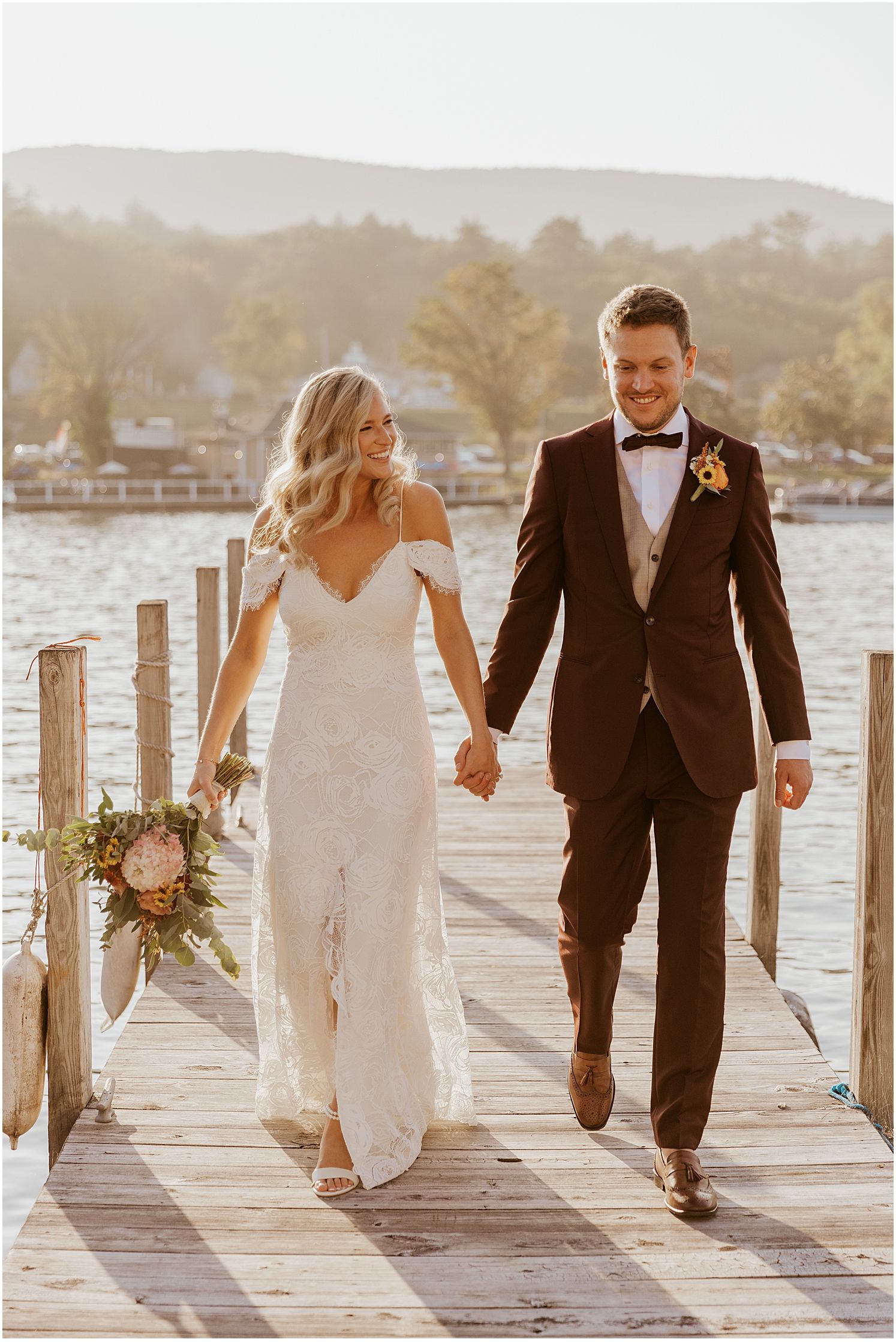 Bride and groom golden hour portraits in Alton Bay NH