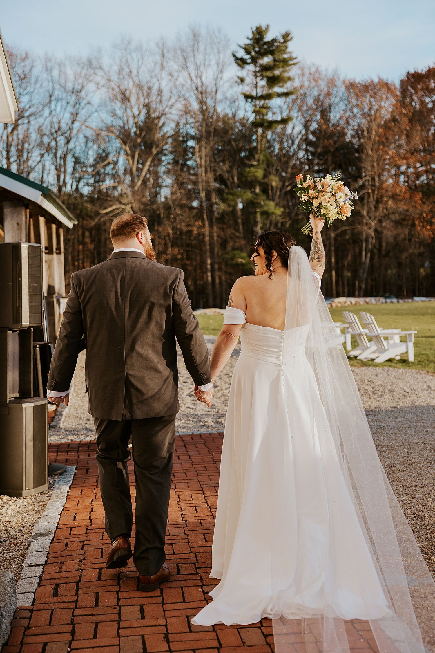 Bride and groom walking back down the aisle after their New Hampshire wedding ceremony