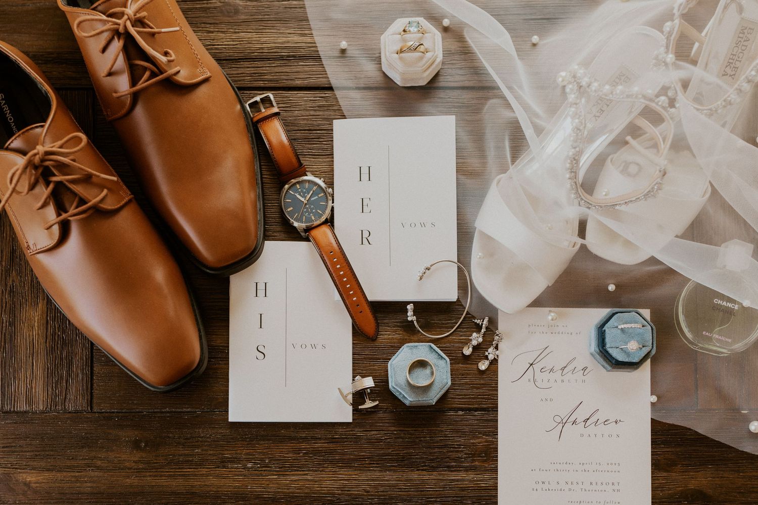 A detail photograph of Kendra and Andrew's wedding day stationary, jewelry and shoes.