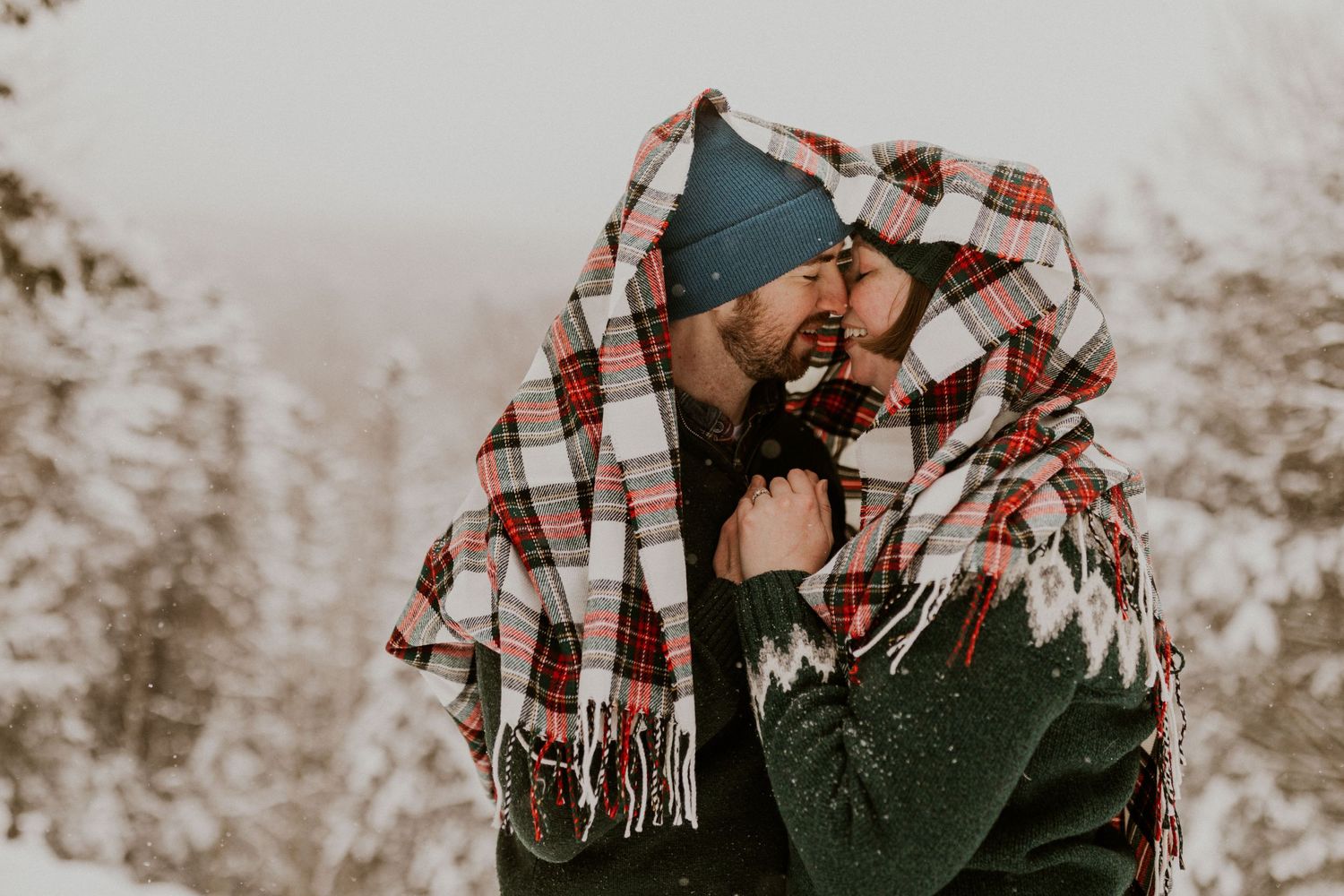 Taylor and Ken snuggling up together in a White Mountain National Forest Shelter while hiking the Flume Gorge in NH.