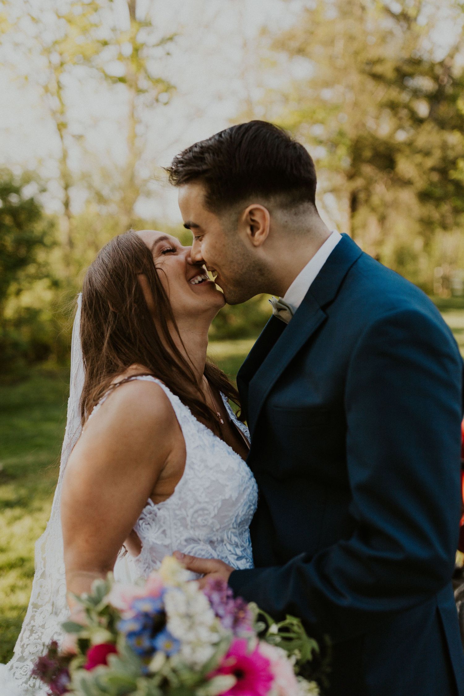 Chrissy and Mike just before they share a kiss together