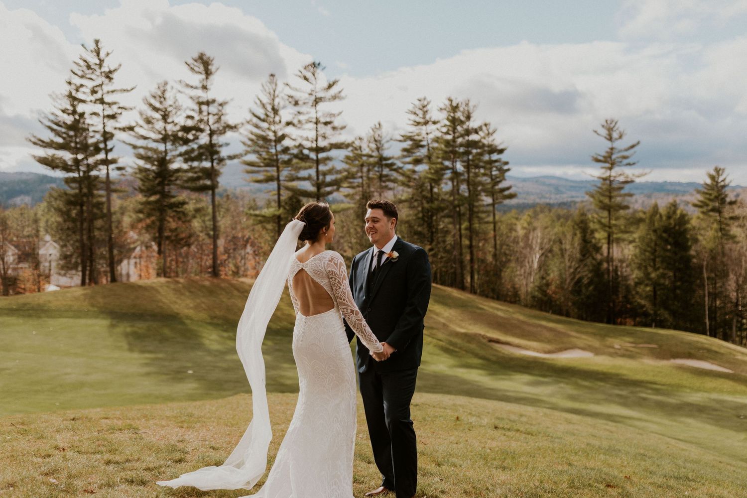First look shared between bride and groom at the Owl's Nest Resort in Thornton, New Hampshire.
