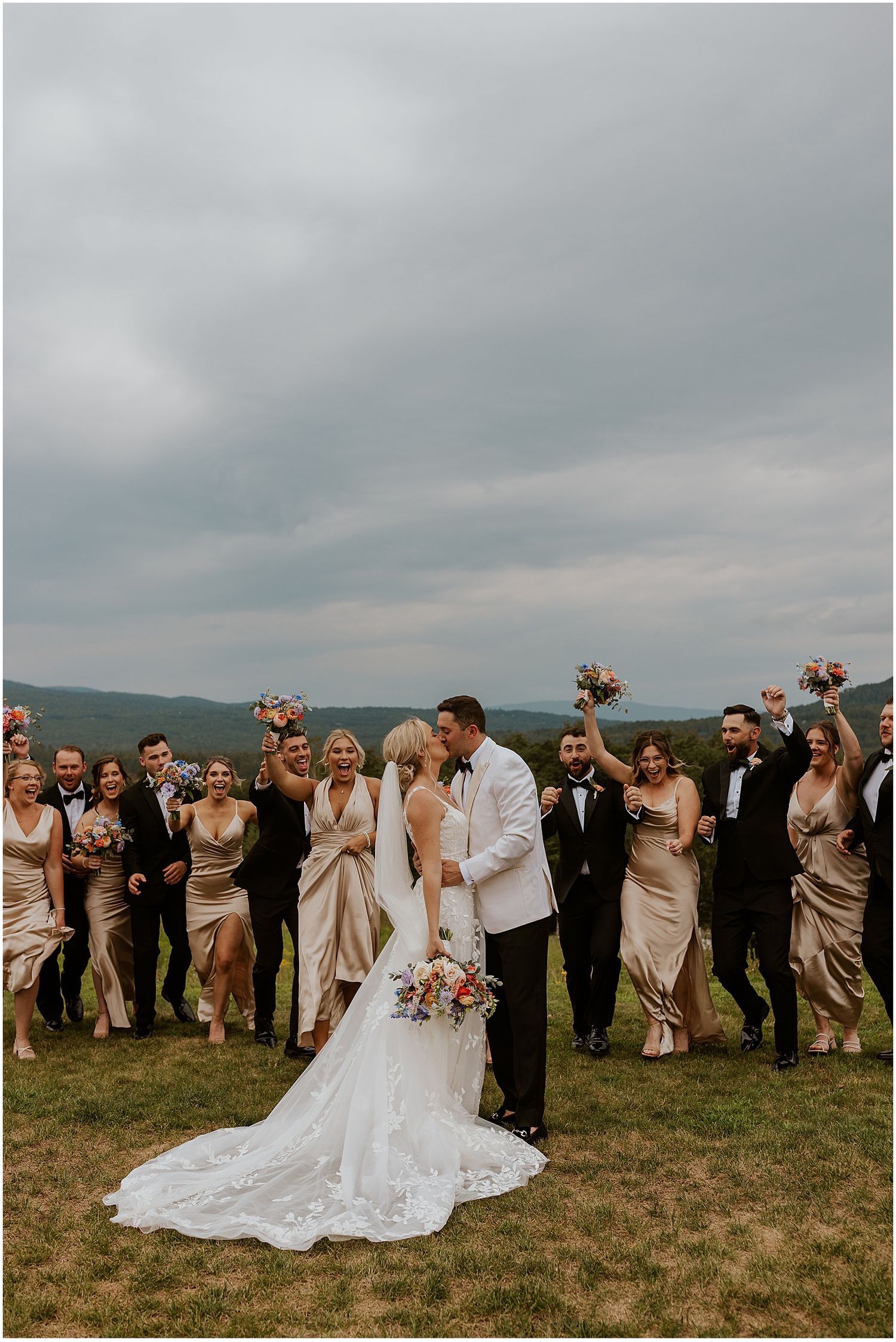 Bride and groom with their wedding party at the Owl's Nest in Thornton, NH