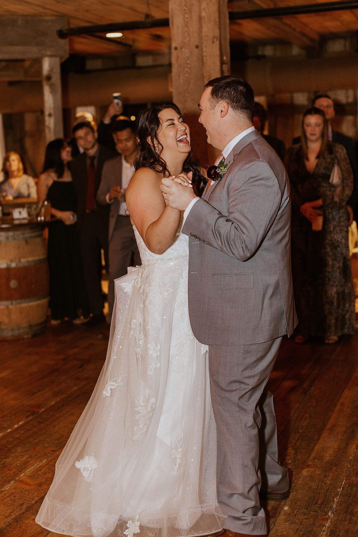 Bride and groom having their first dance at their New Hampshire barn wedding