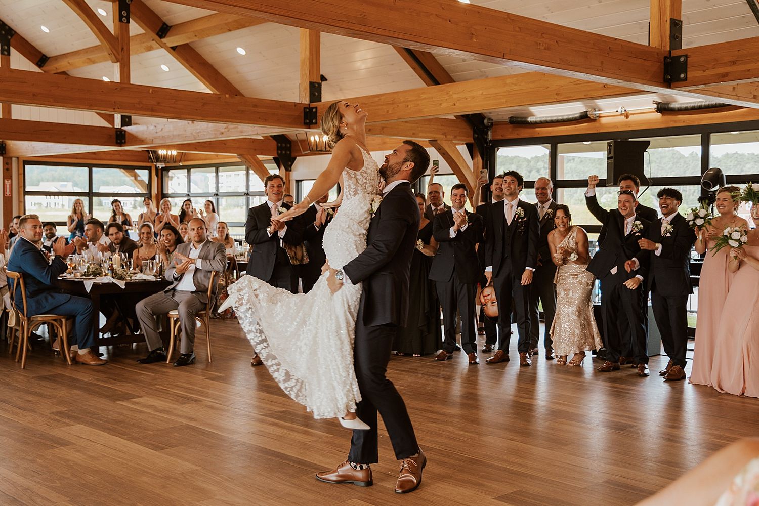 Bride and groom having their first dance at their wedding at the Sunset Pavilion at the Owls' Nest Resort in New Hampshire