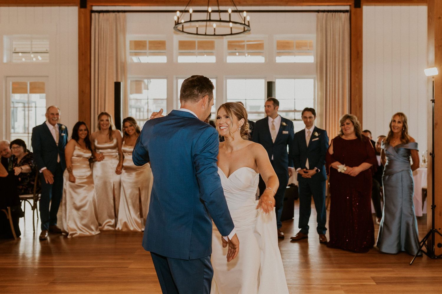Kendra and Andrew sharing their first dance together as husband and wife at the Lake House at Owl's Nest Resort